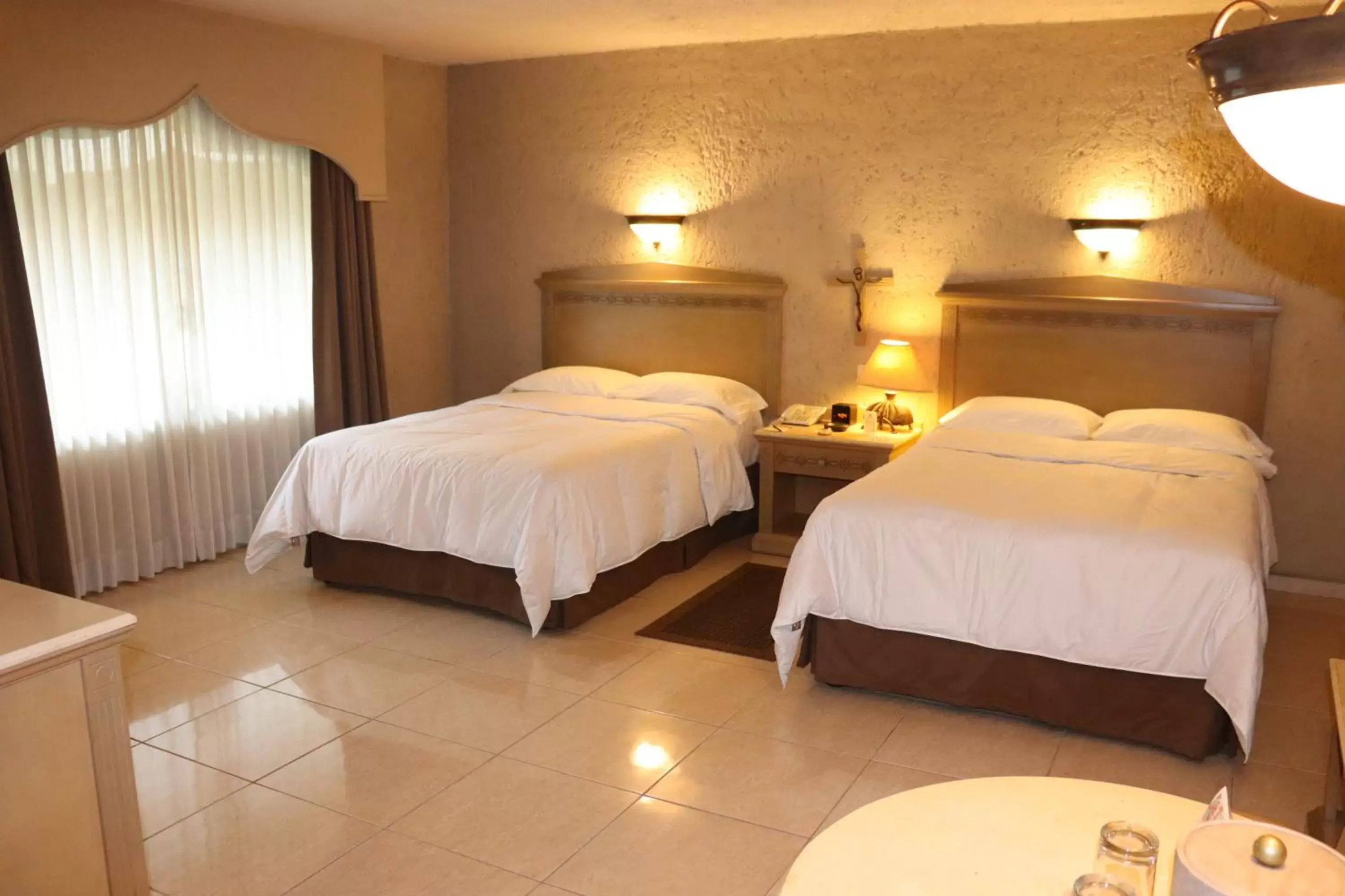 Photo of the whole room, Bed in Suites Layfer, Córdoba, Veracruz, México