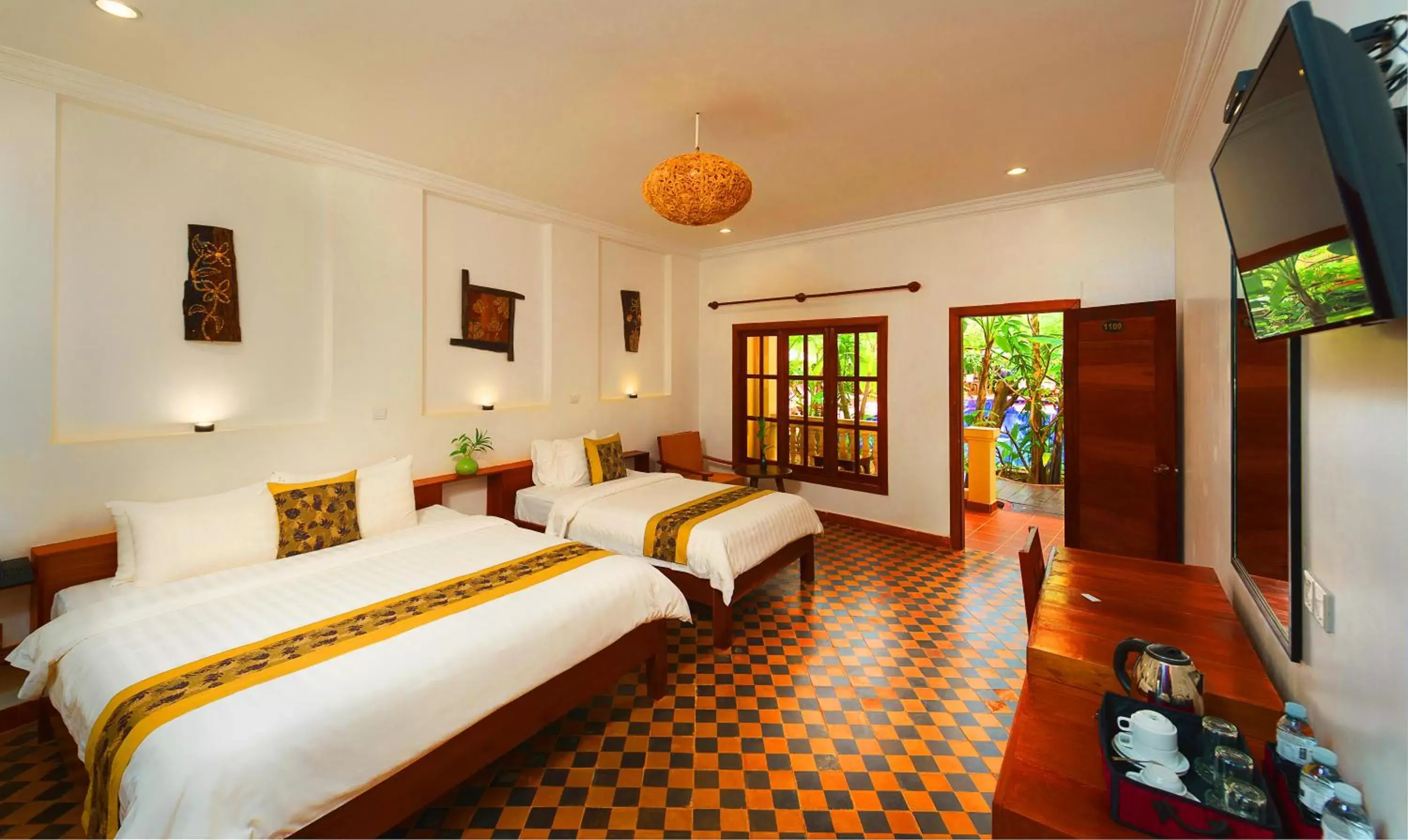 Bedroom in Le Jardin d'Angkor Hotel & Resort