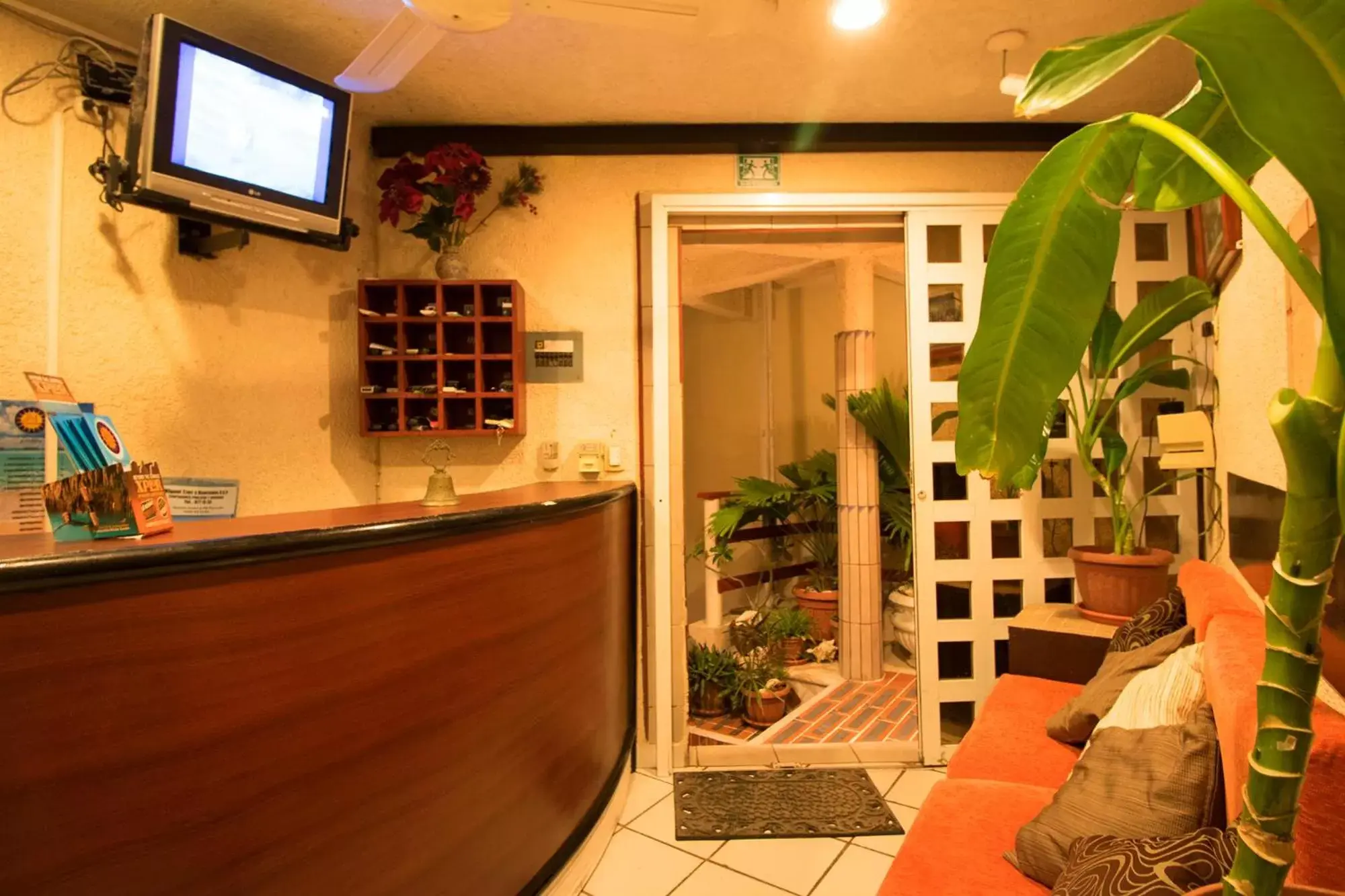 Lobby or reception, Lounge/Bar in Sol Caribe Departamentos & Suites