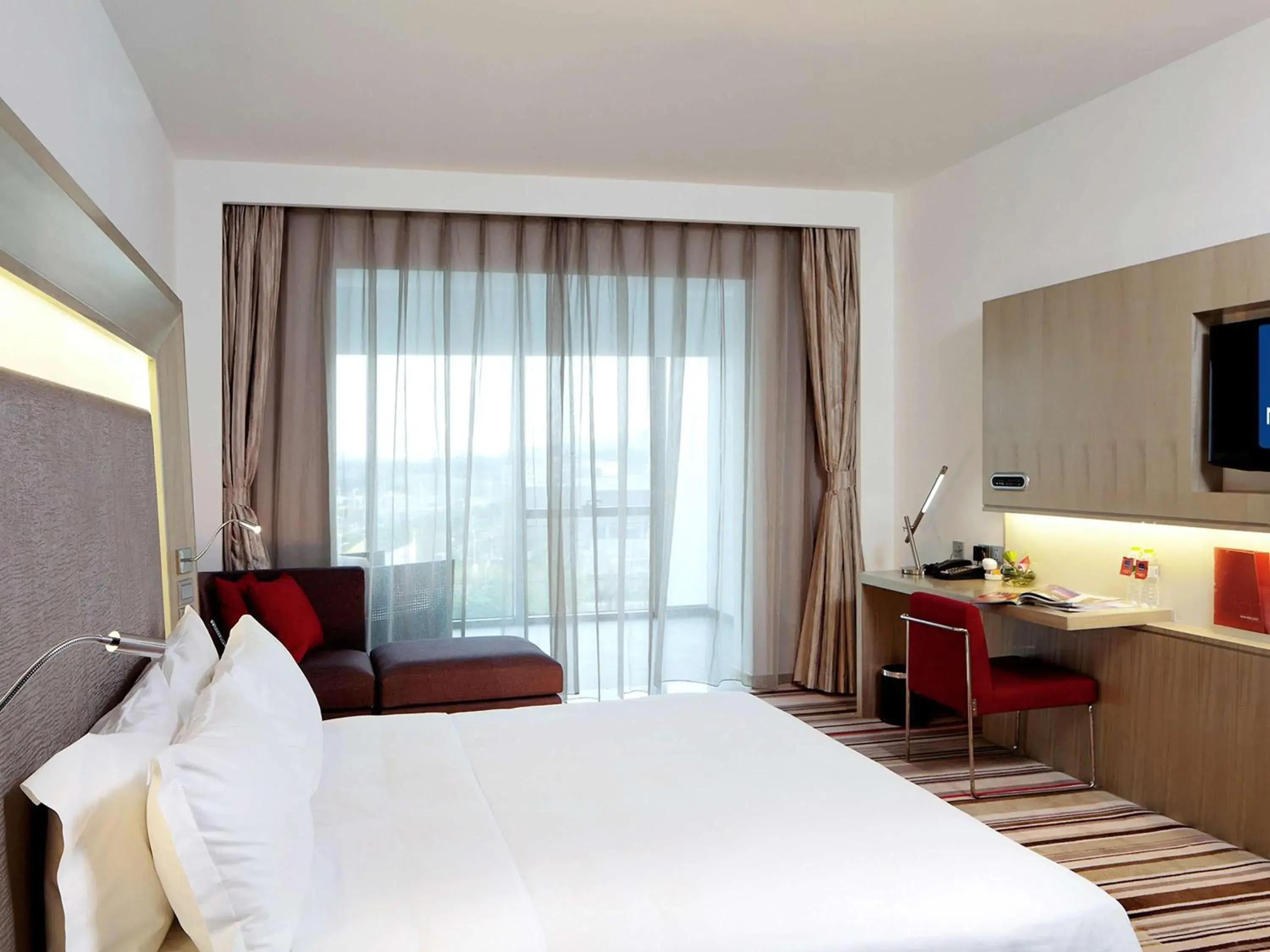 Photo of the whole room, Bed in Novotel Nanjing East Suning Galaxy