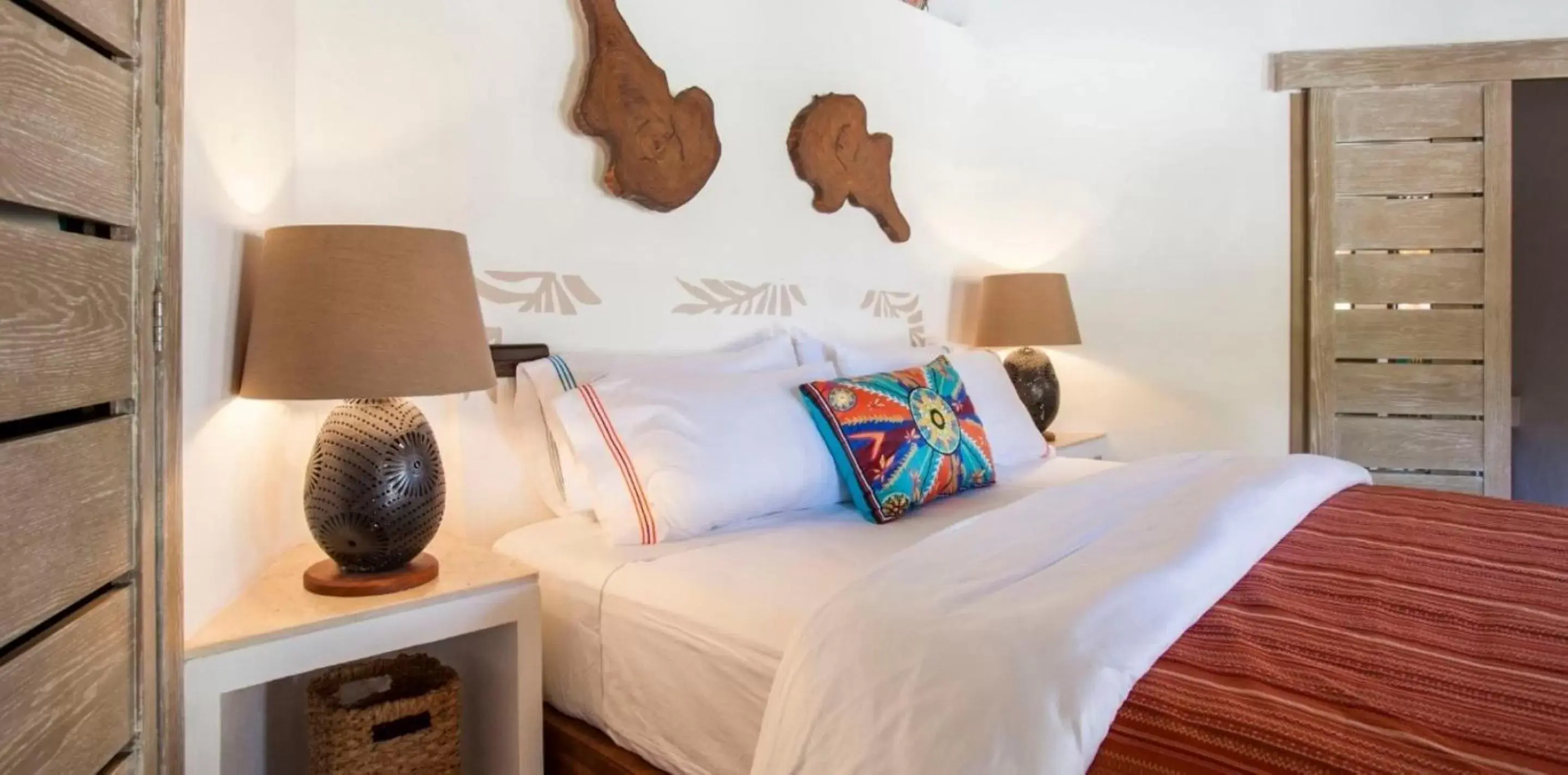 Bed in Mahekal Beach Front Resort & Spa