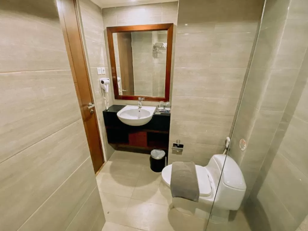 Toilet in Sapphire Sky Hotel & Conference