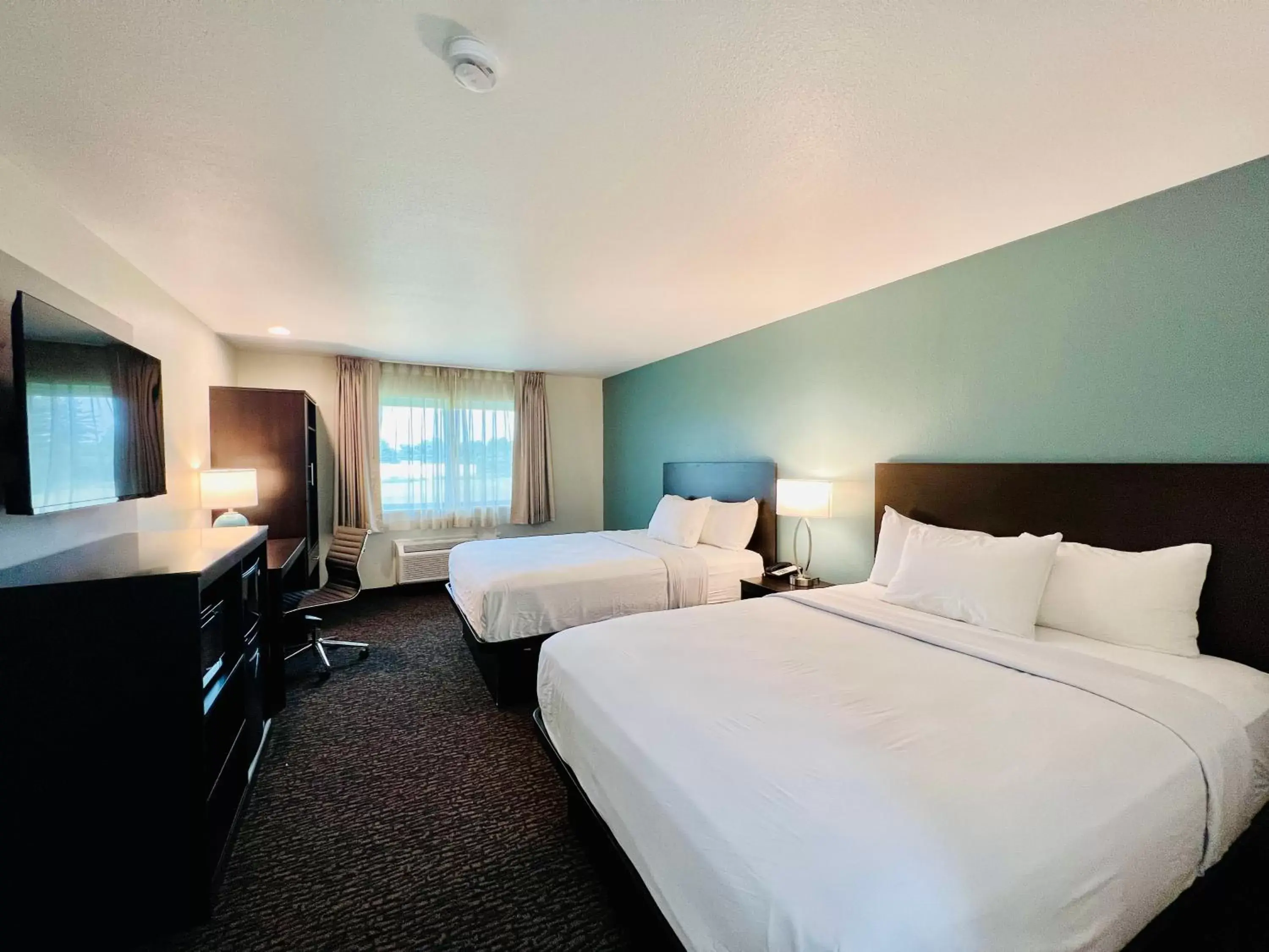 Bed in Americas Best Value Inn Wisconsin Dells-Lake Delton - Newly renovated