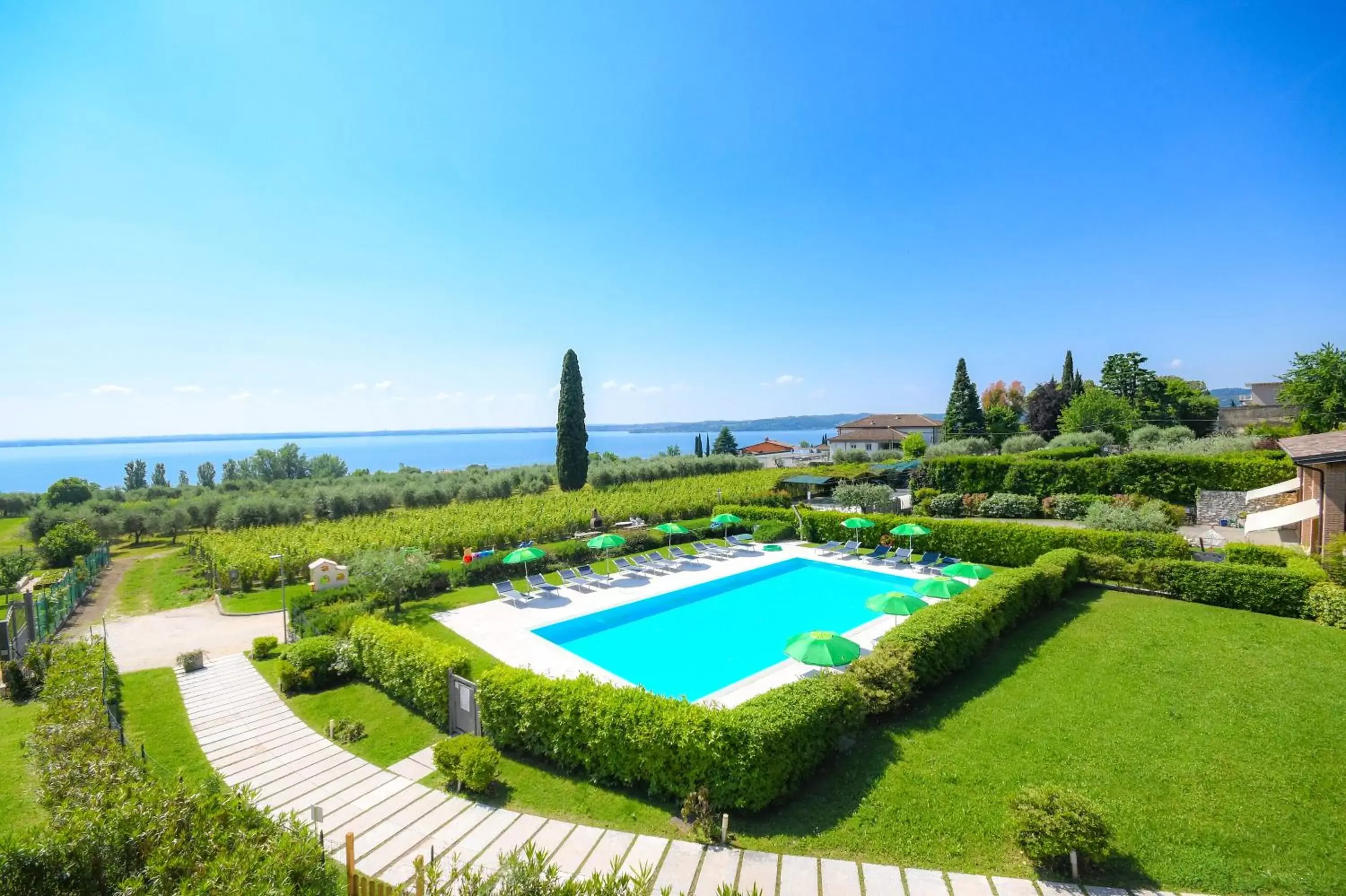 Swimming Pool in Residence Corte Ferrari -Ciao Vacanze-