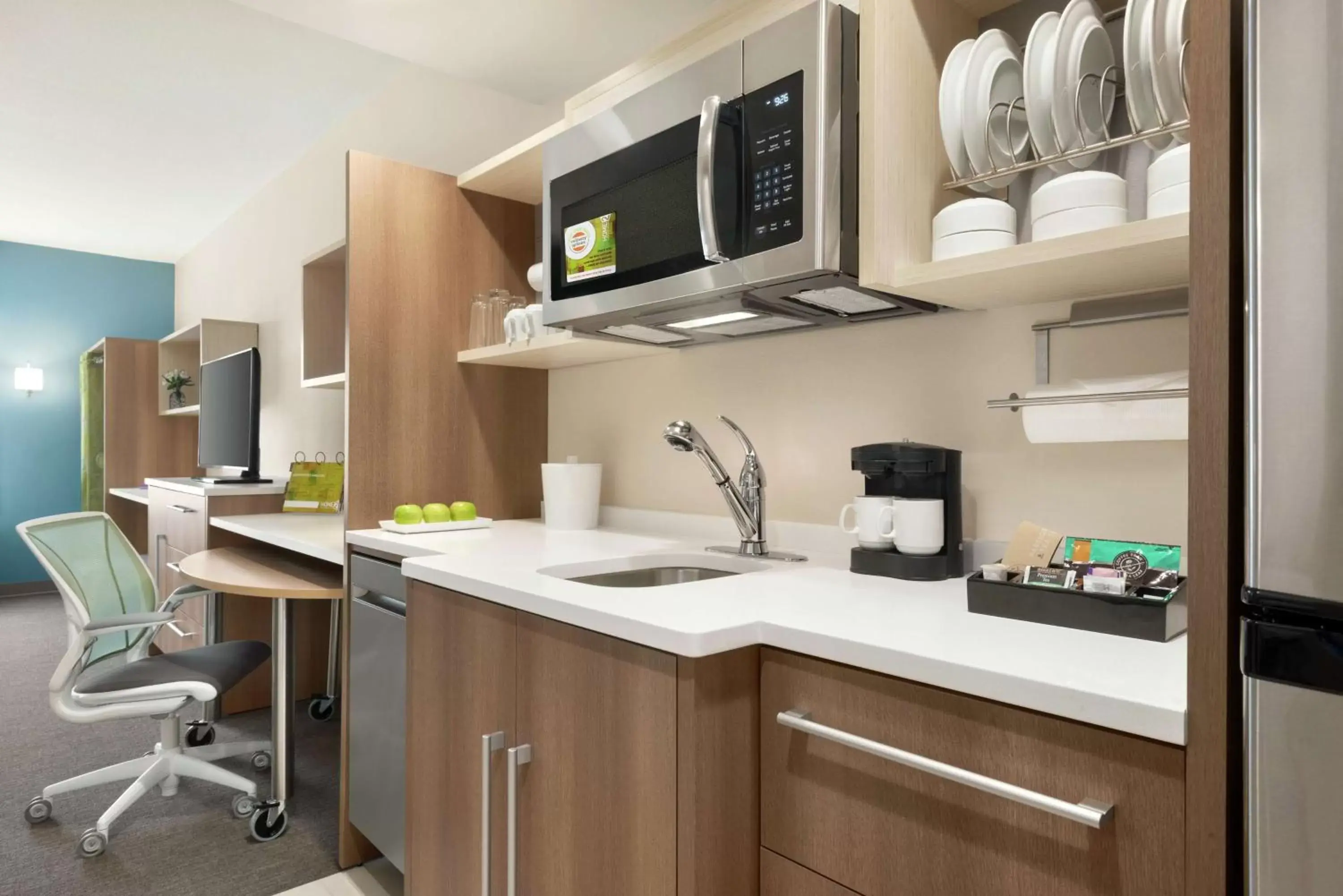 Bedroom, Kitchen/Kitchenette in Home2 Suites By Hilton Overland Park, Ks