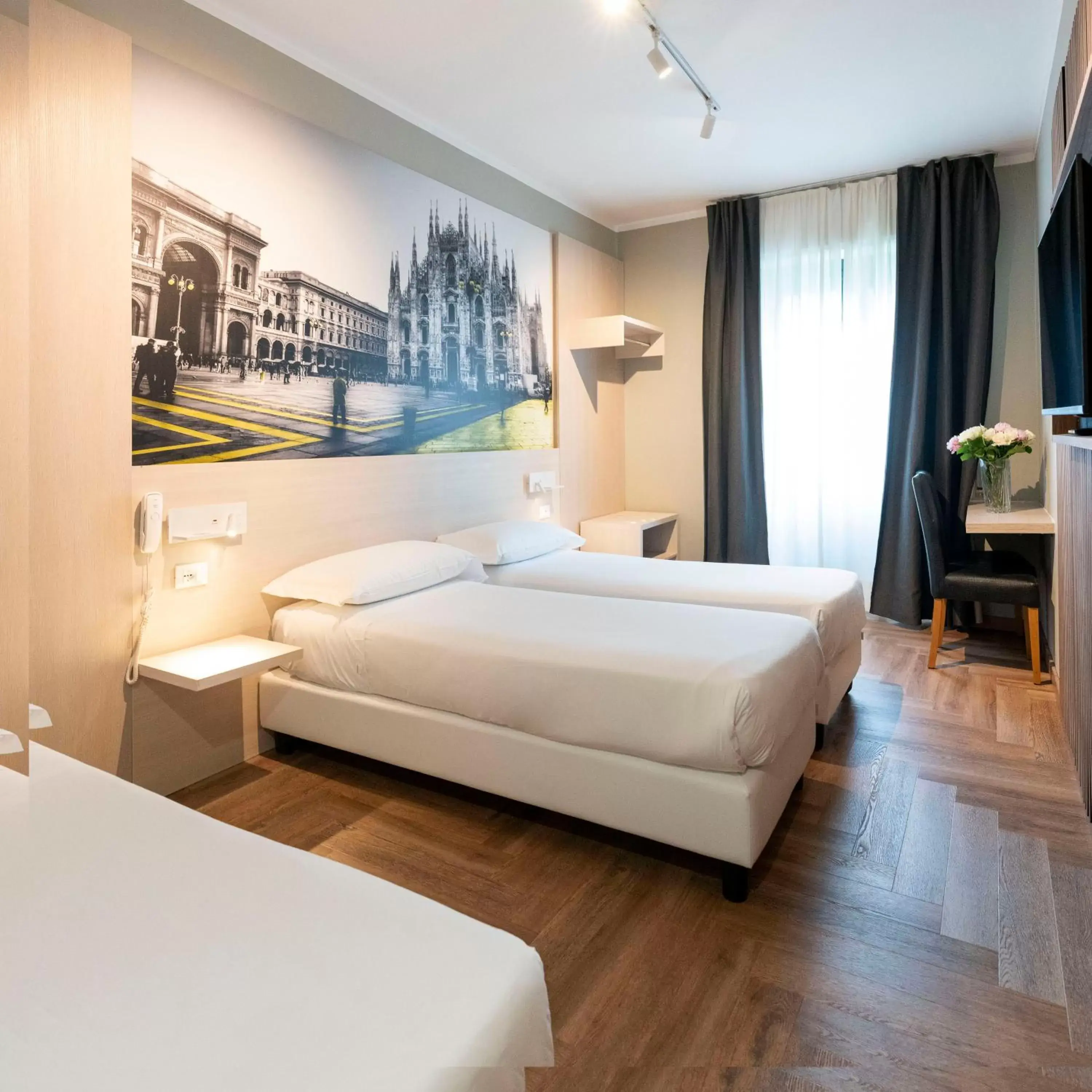 Bed in Kleos Hotel Milano