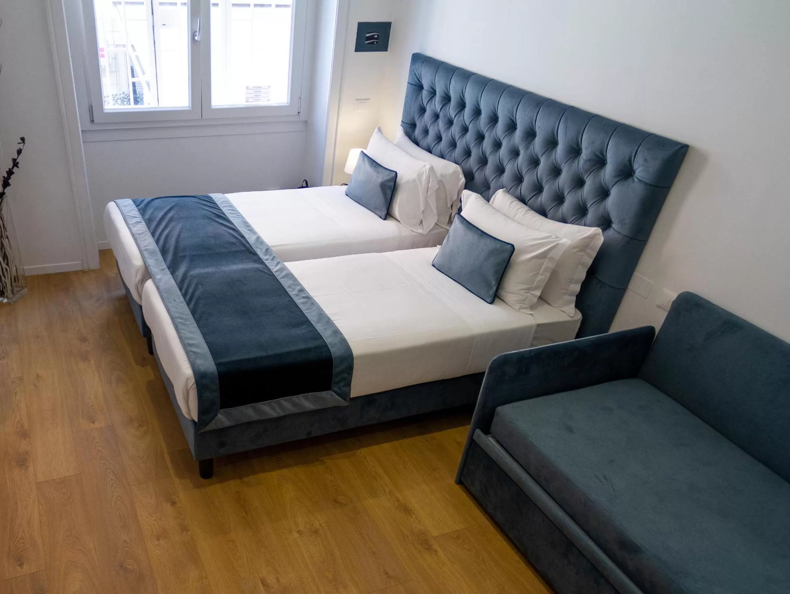 Bed in Michelangelo Vatican Rooms