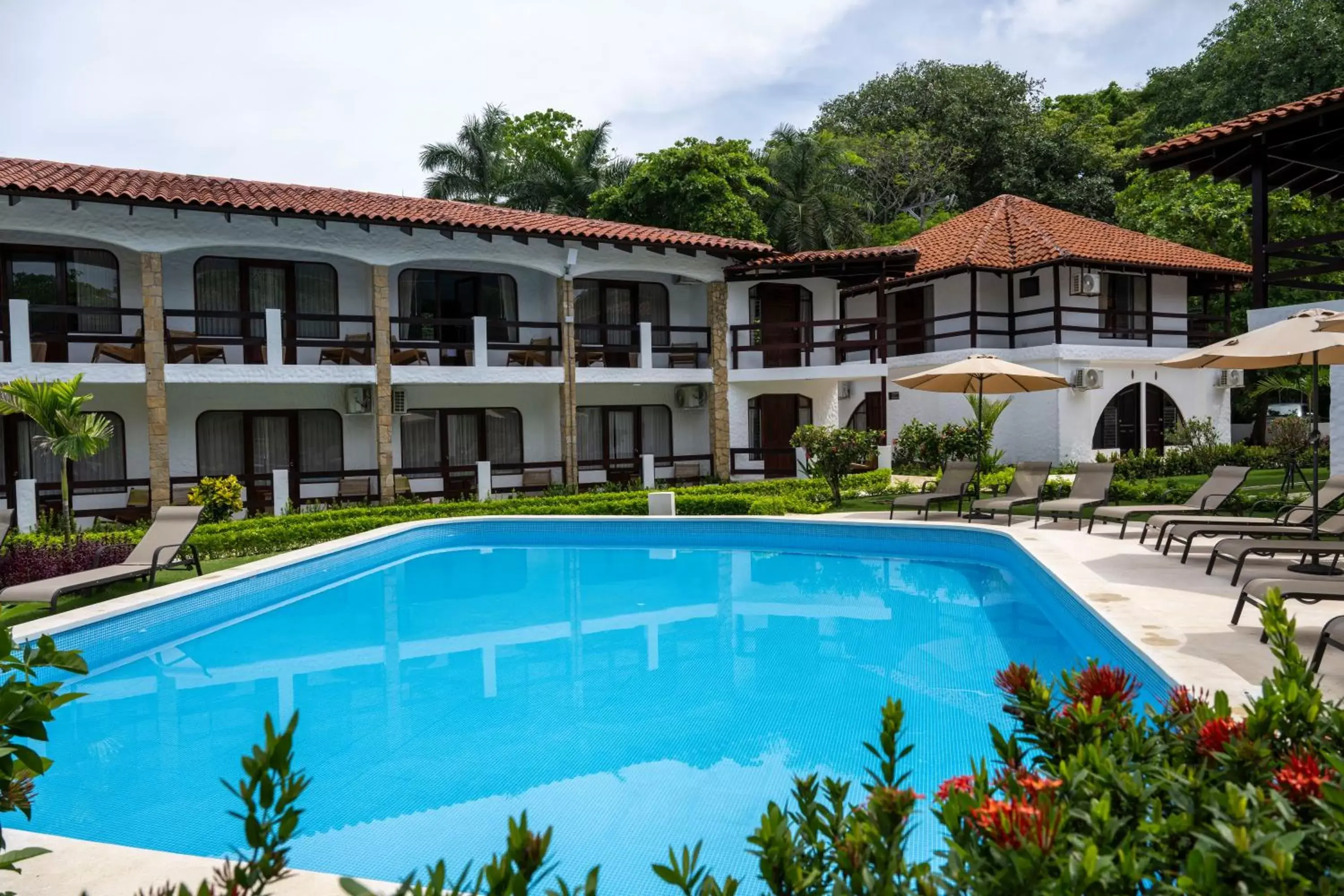 Pool view, Property Building in Fuego del Sol Beachfront Hotel