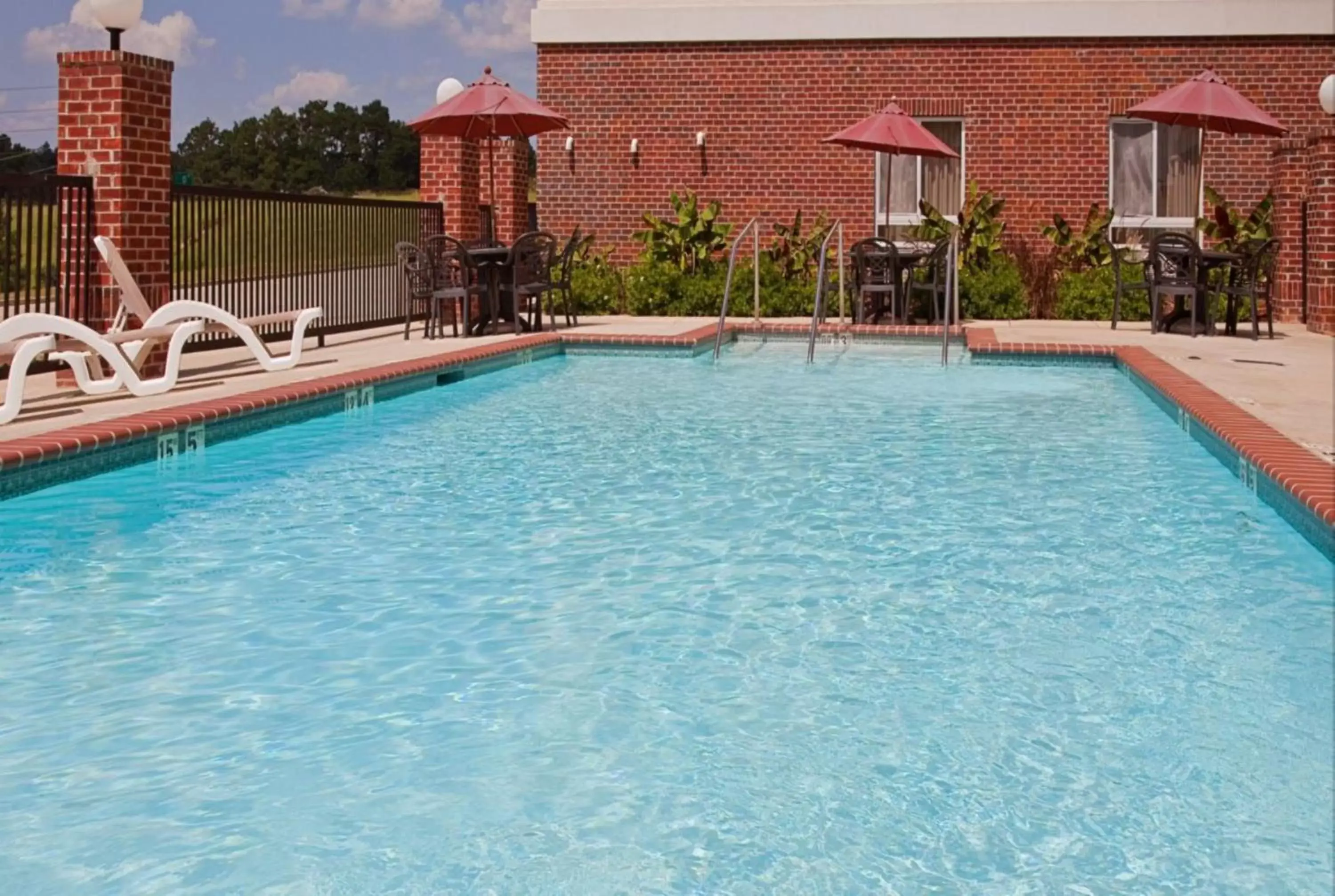 Swimming Pool in Holiday Inn Express Hotel & Suites Lucedale, an IHG Hotel