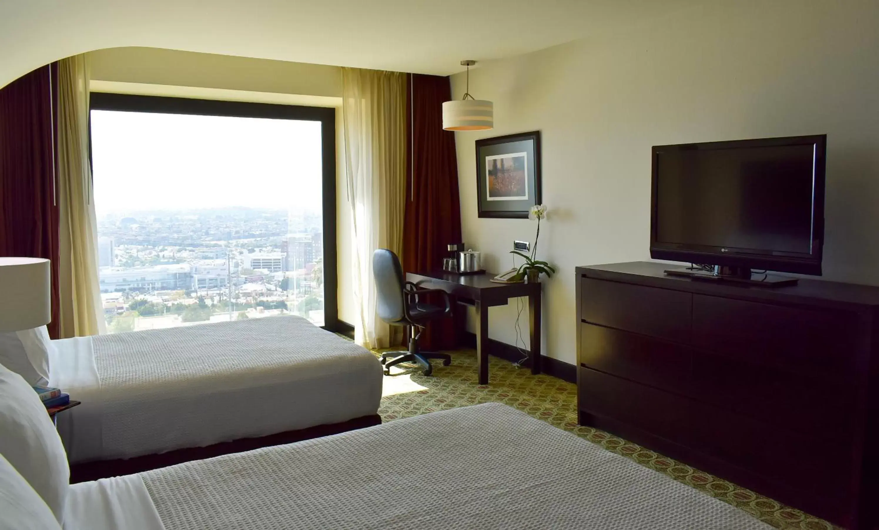 Photo of the whole room, TV/Entertainment Center in Hotel Diamante Queretaro