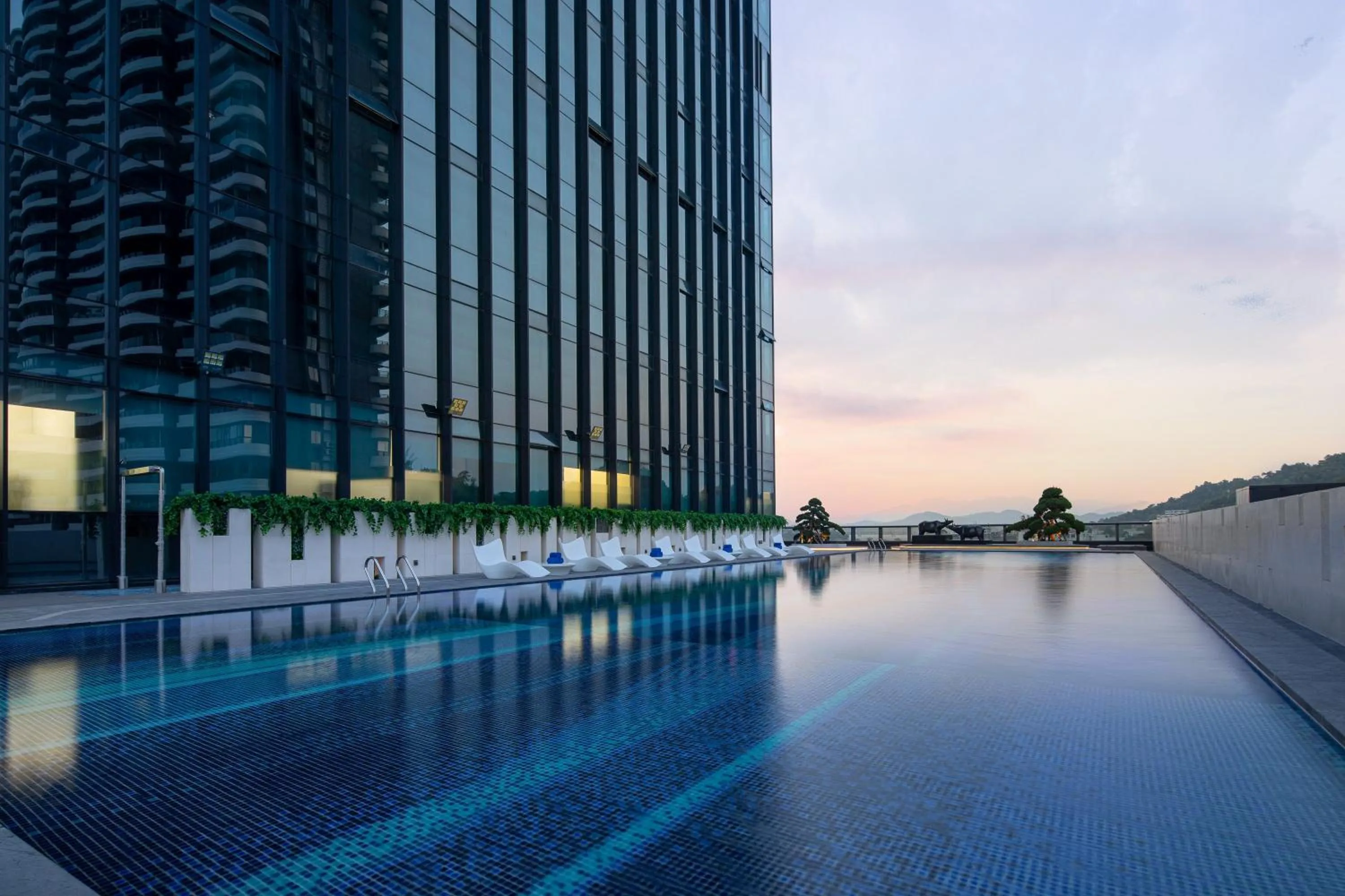 Swimming pool in Crowne Plaza Chaozhou Riverside by IHG