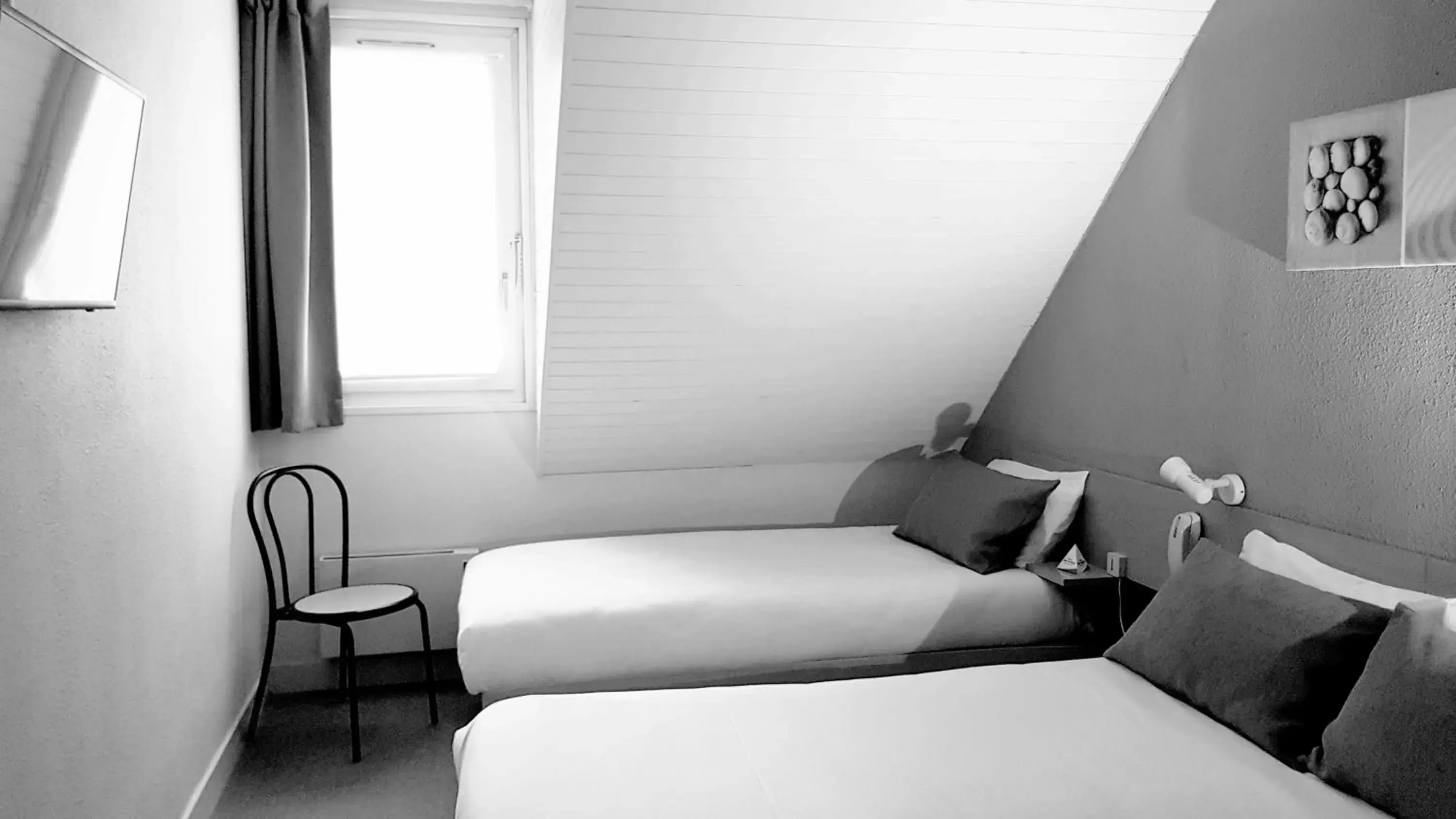 Photo of the whole room, Bed in Tourhotel Blois