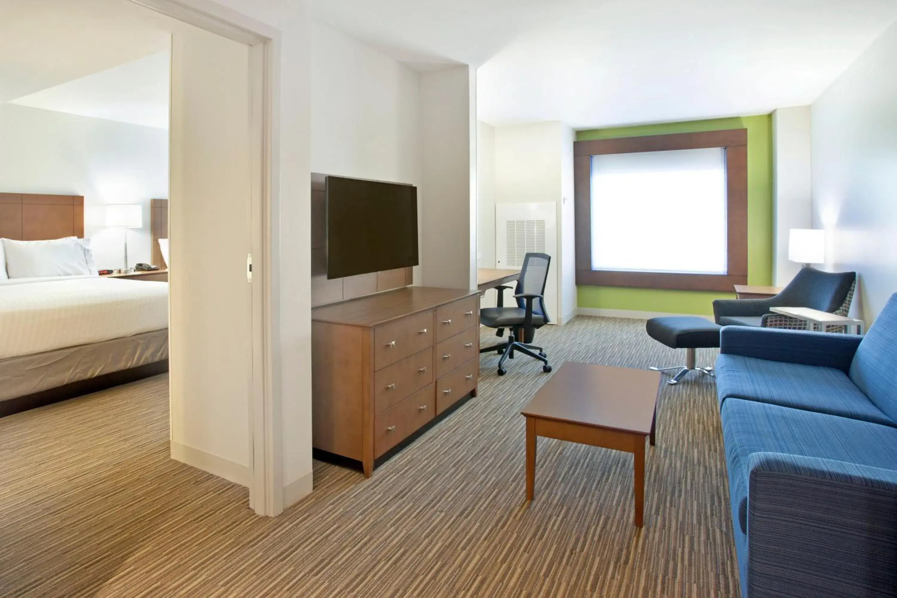 Photo of the whole room, TV/Entertainment Center in Holiday Inn Express Hotel & Suites Austin Downtown - University, an IHG Hotel