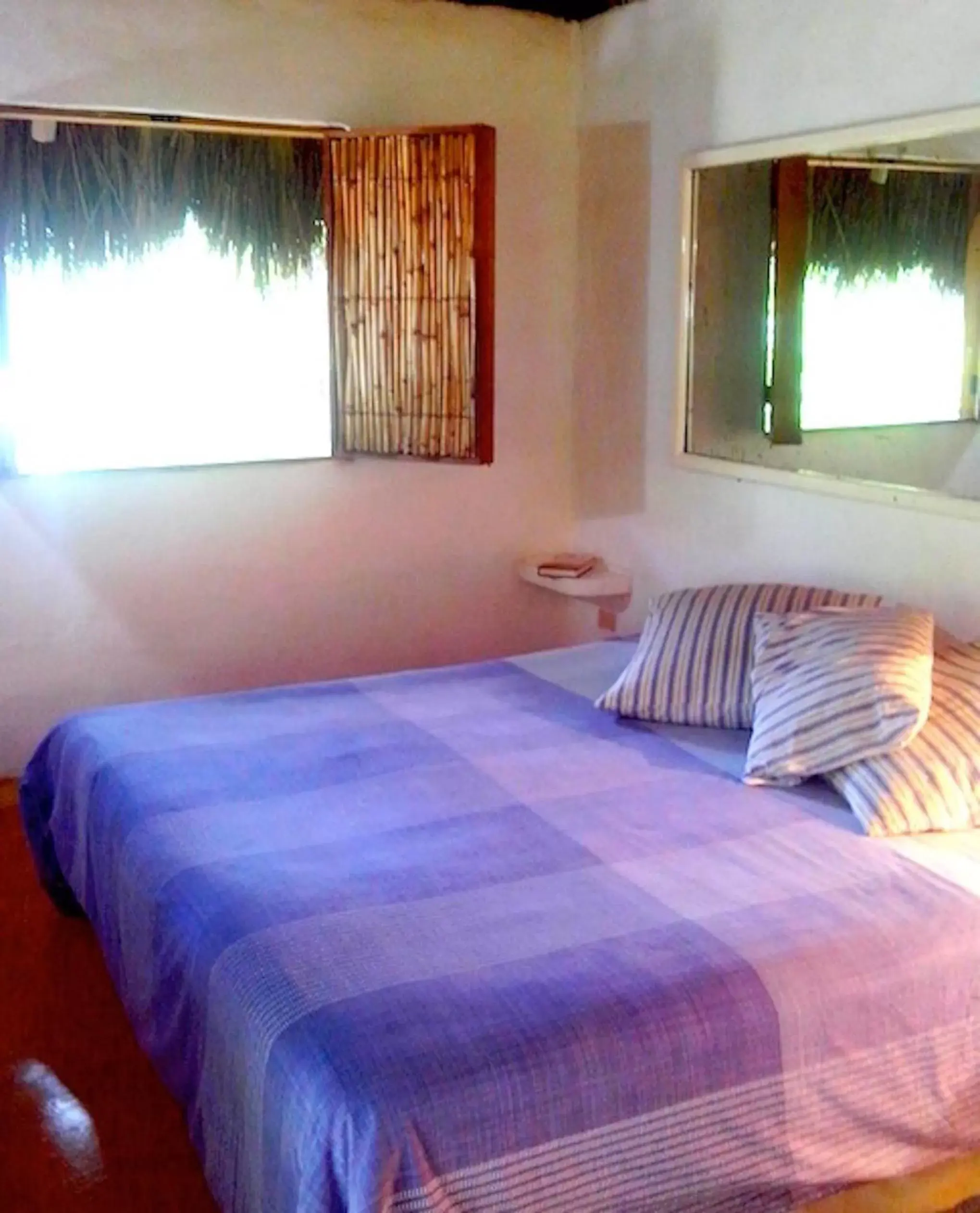 Bed in Junto al Rio Bungalows & Suites