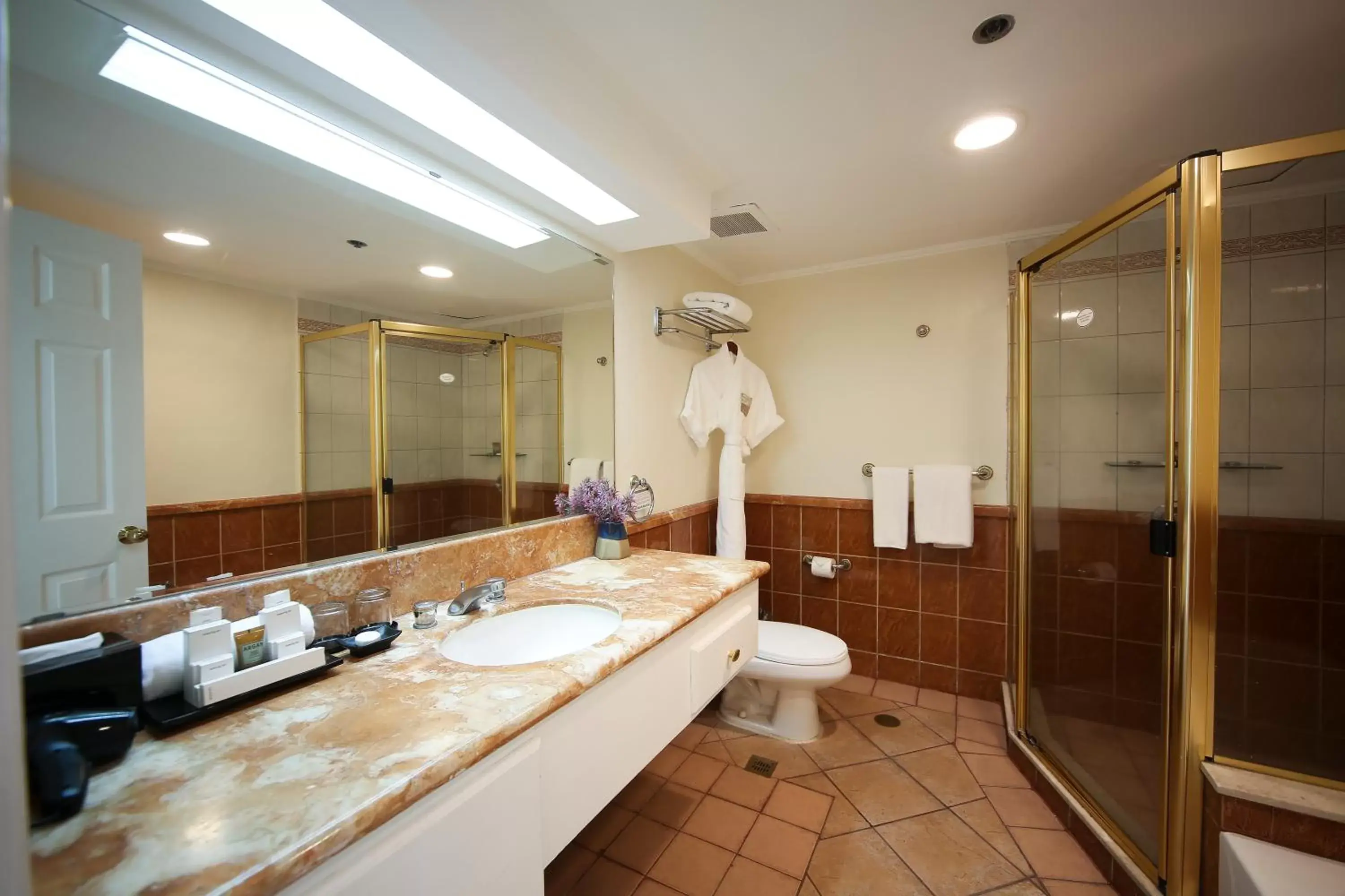 Shower, Bathroom in Infinity Tower Suites