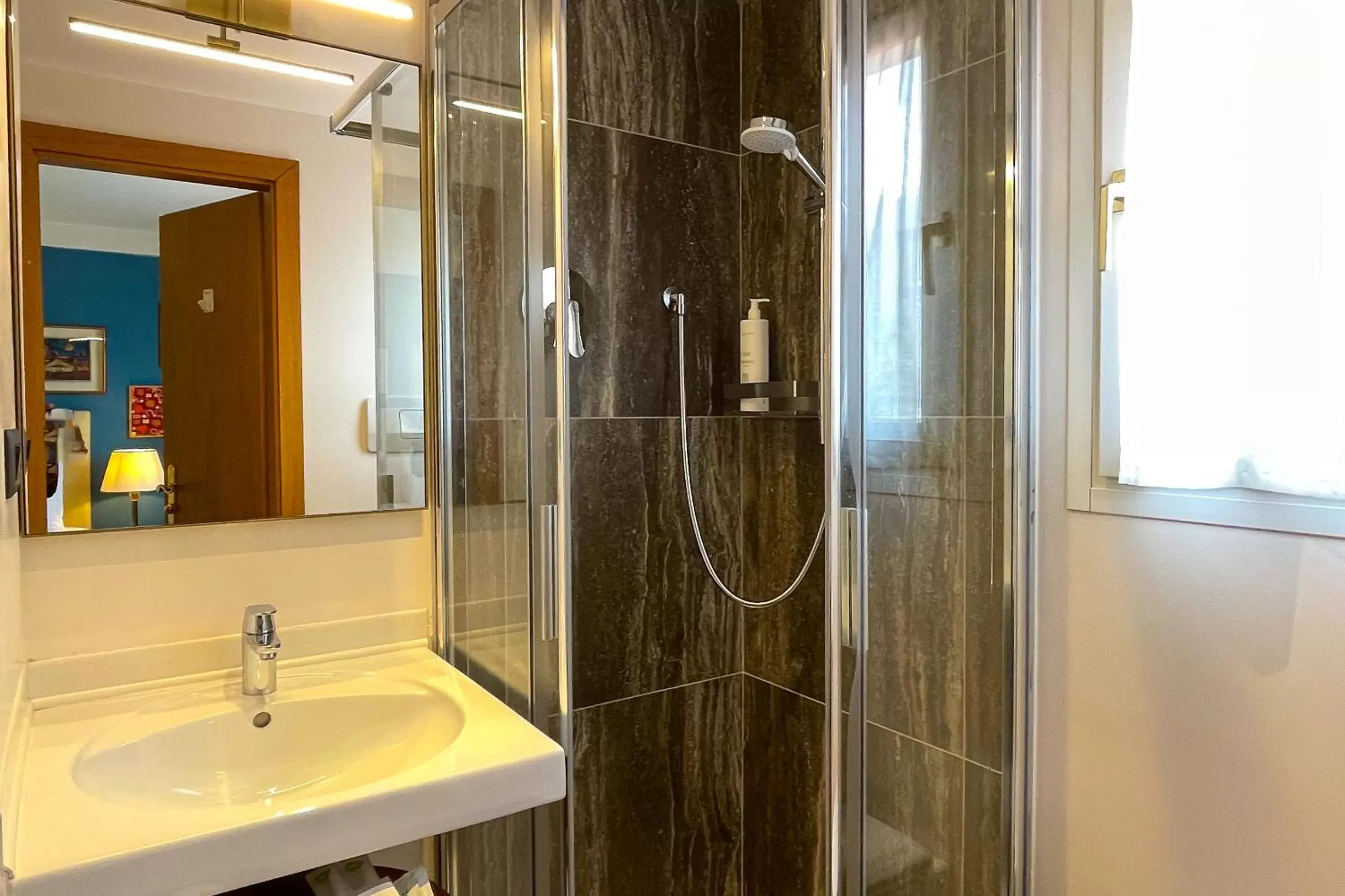 Shower, Bathroom in Hotel Rovereto