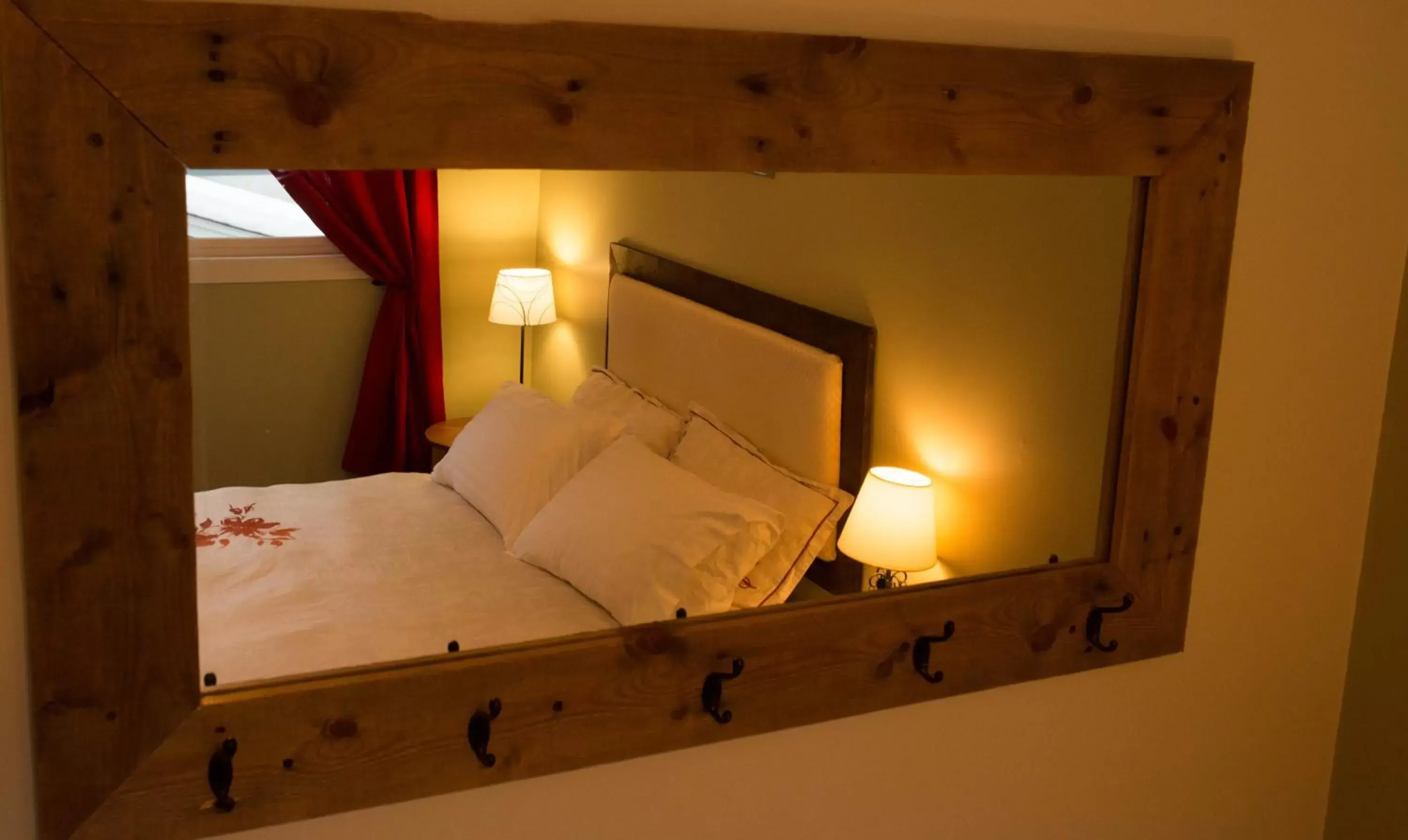 Decorative detail, Bed in Alpenrose Revelstoke Bed & Breakfast