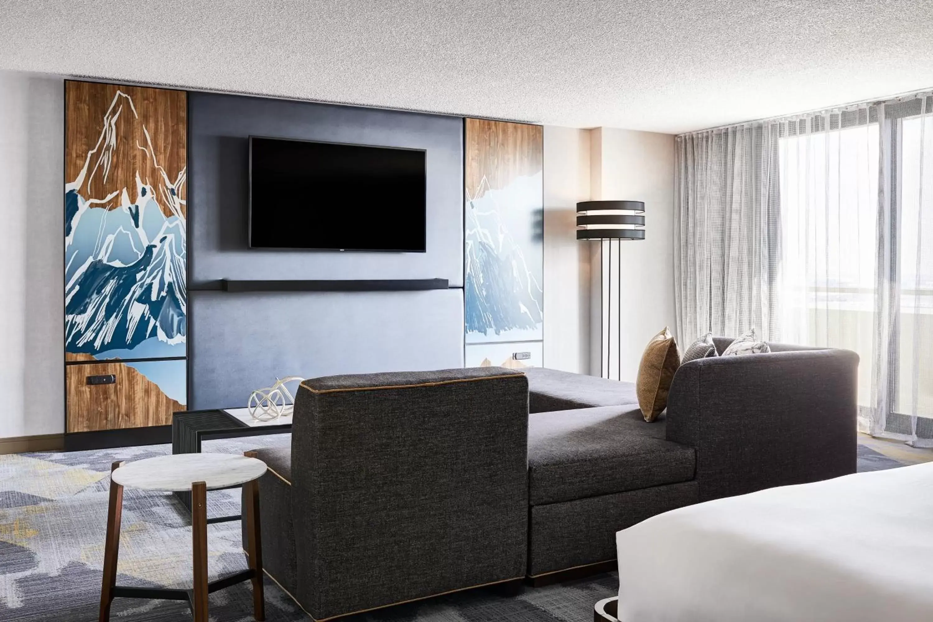 Living room, Seating Area in Renaissance Denver Central Park Hotel