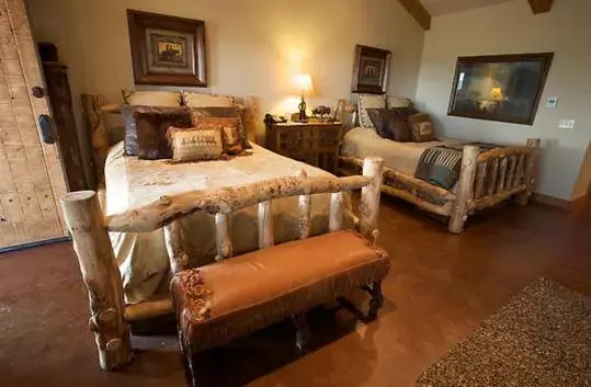 Bed in Wildcatter Ranch and Resort