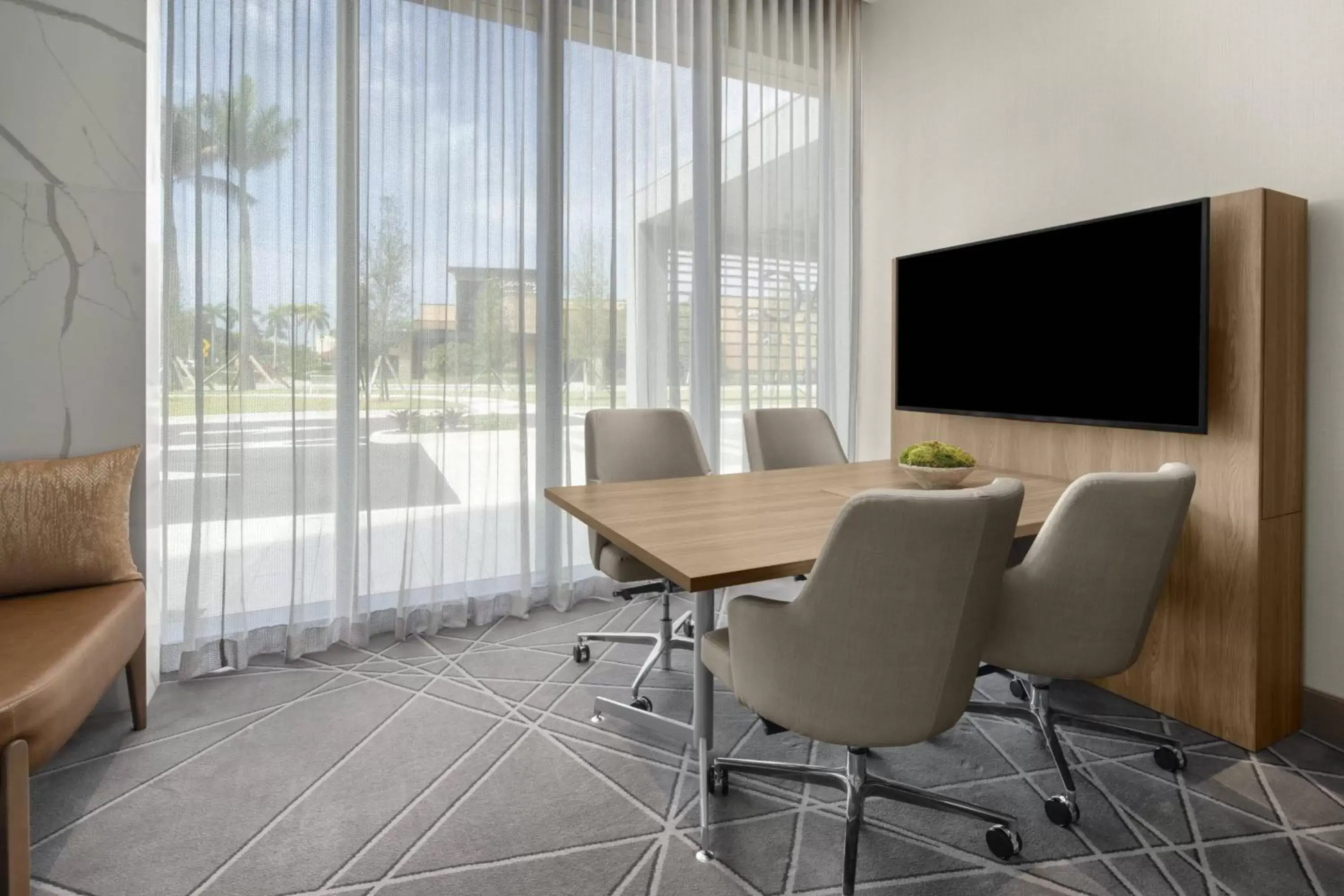 Meeting/conference room, TV/Entertainment Center in AC Hotel by Marriott Fort Lauderdale Sawgrass Mills Sunrise
