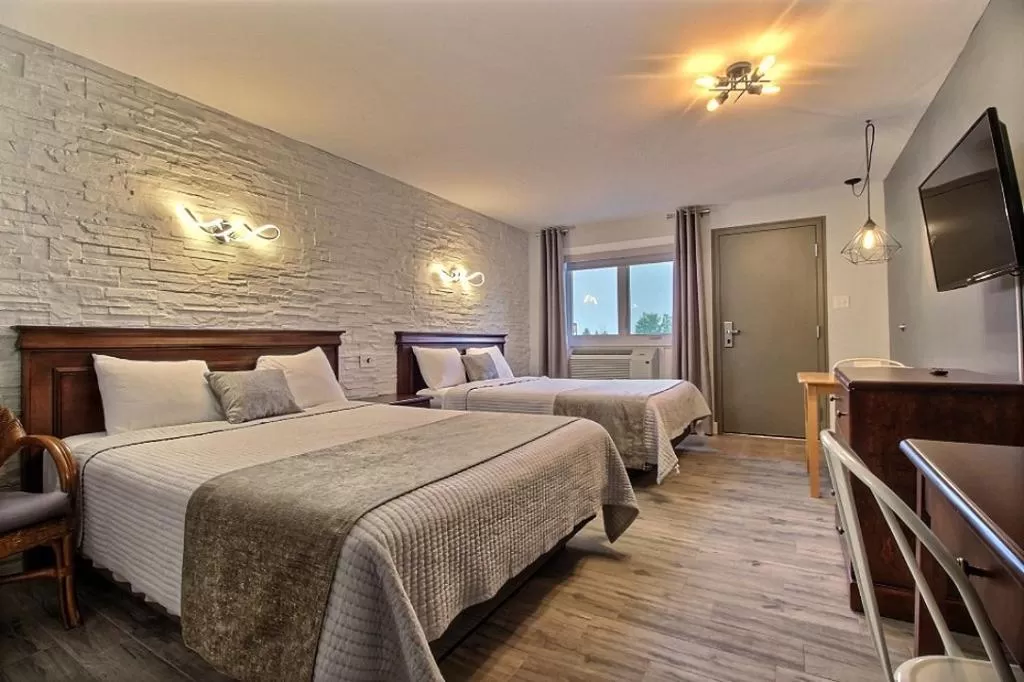 Bed in Hotel Motel Le Quiet