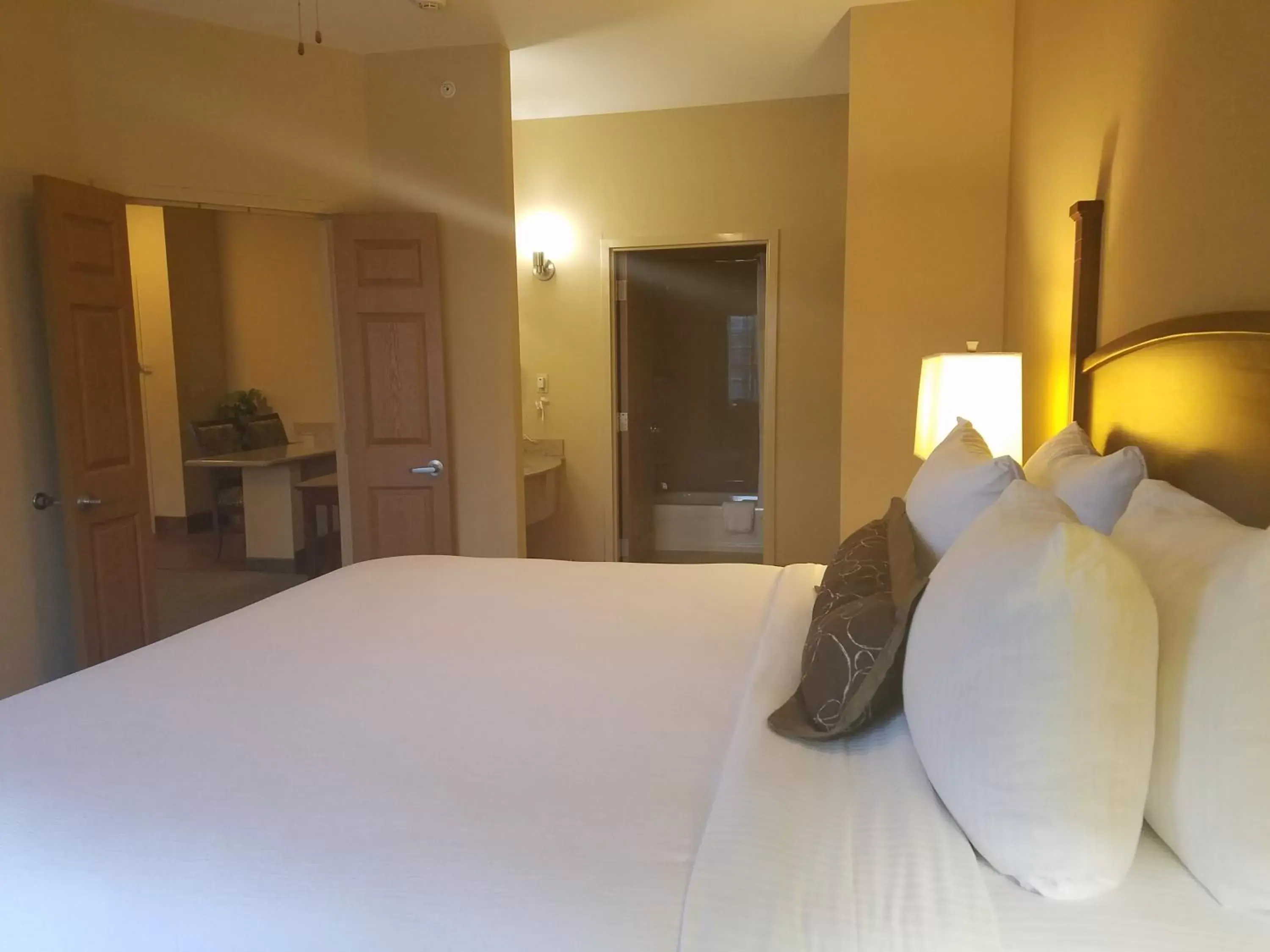 Bed in Staybridge Suites Rogers - Bentonville, an IHG Hotel