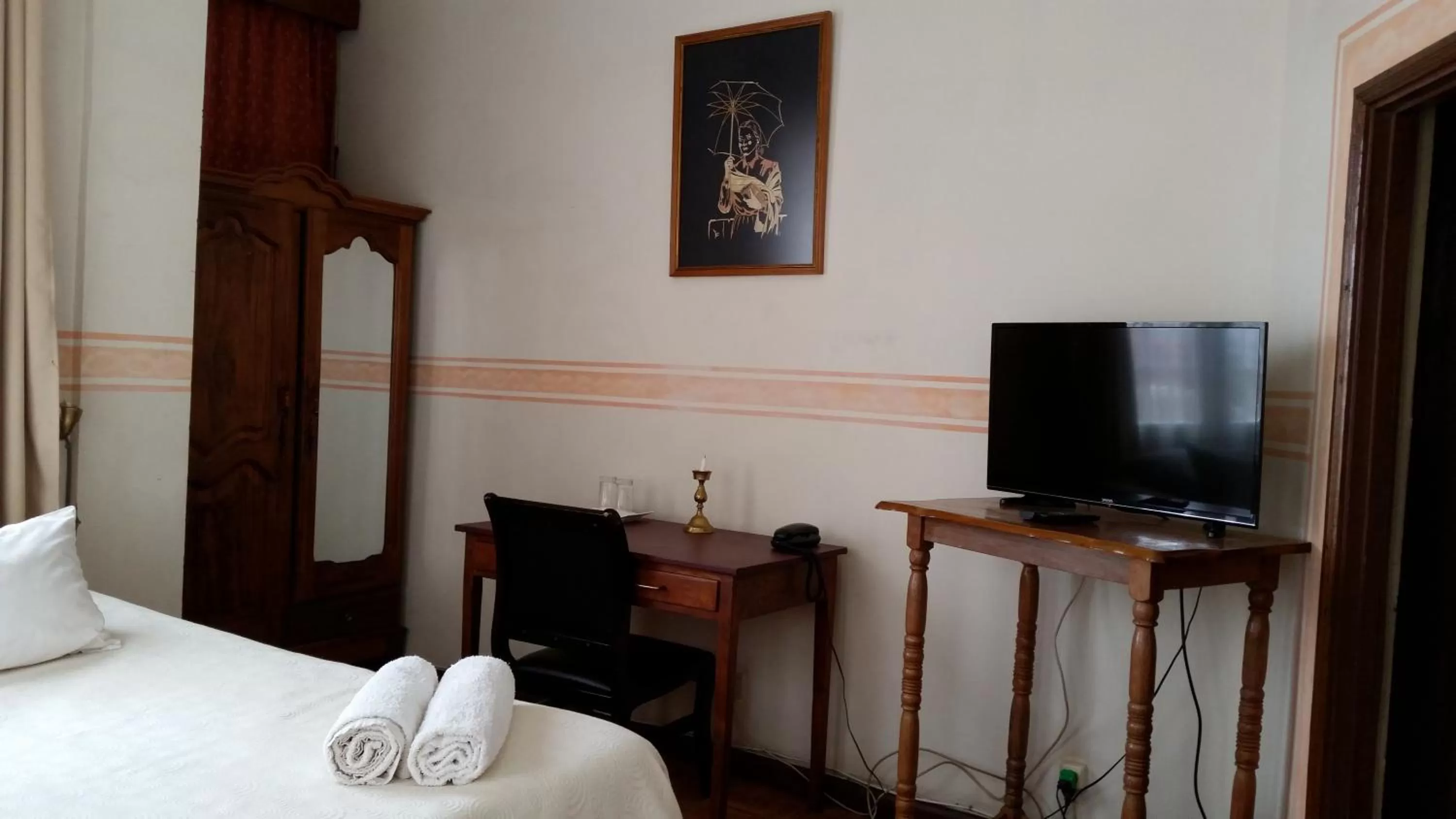 TV and multimedia, Bed in Relais De La Haute Ville Tana