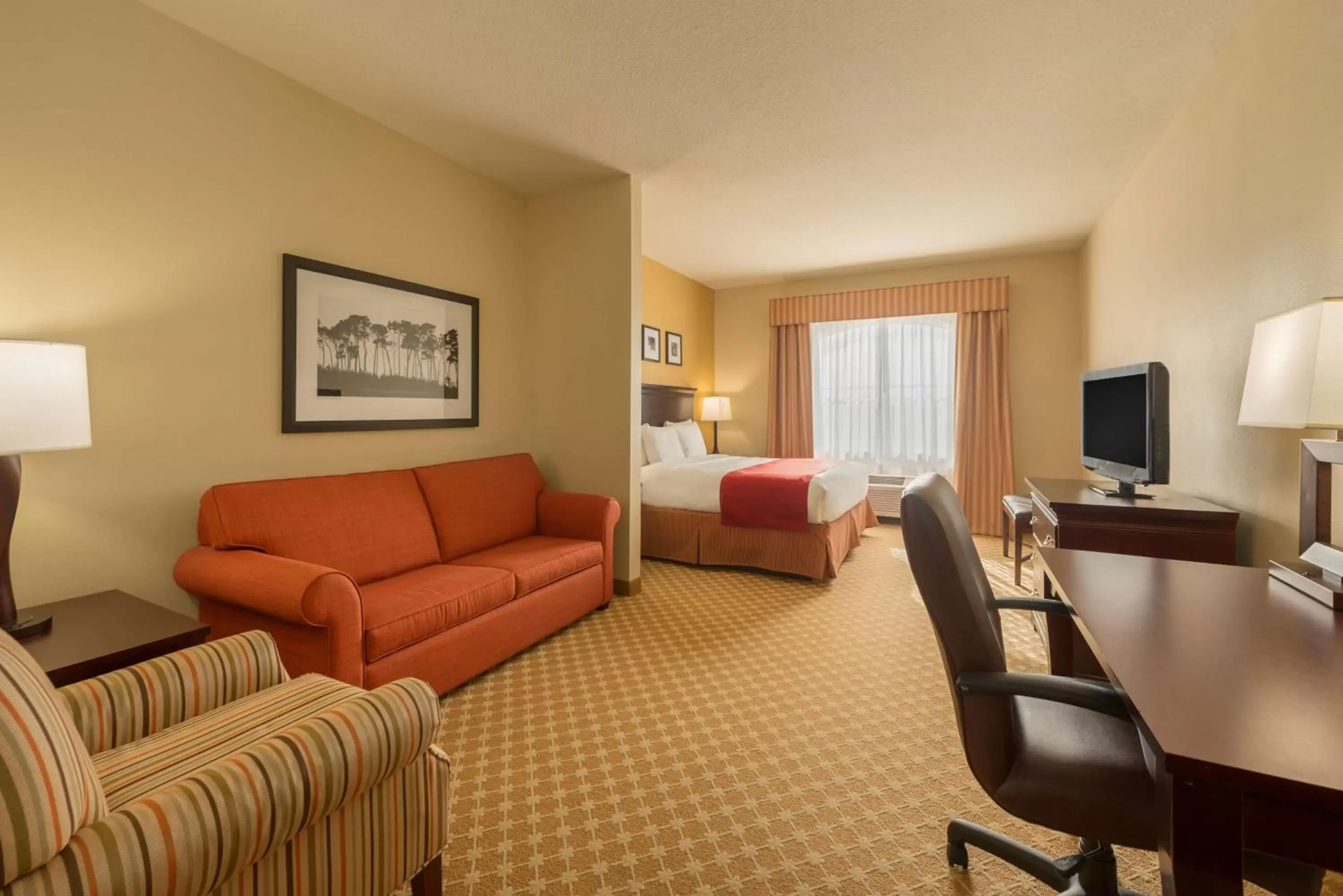 Photo of the whole room, Seating Area in Country Inn & Suites by Radisson, Port Orange-Daytona, FL