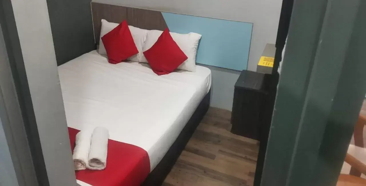 Bed in Lucky Hotel