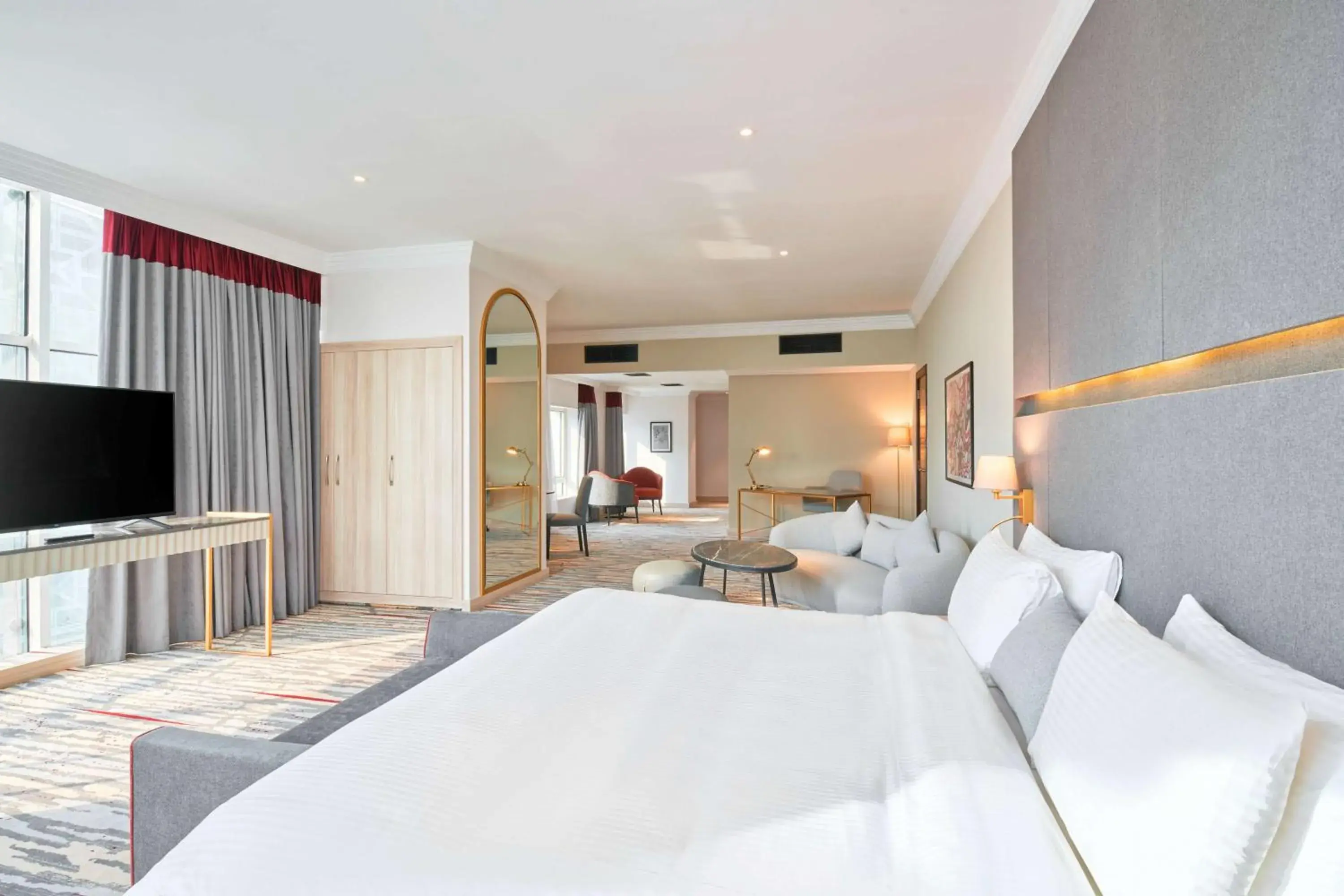 Photo of the whole room, Bed in Ramada by Wyndham Doha Old Town