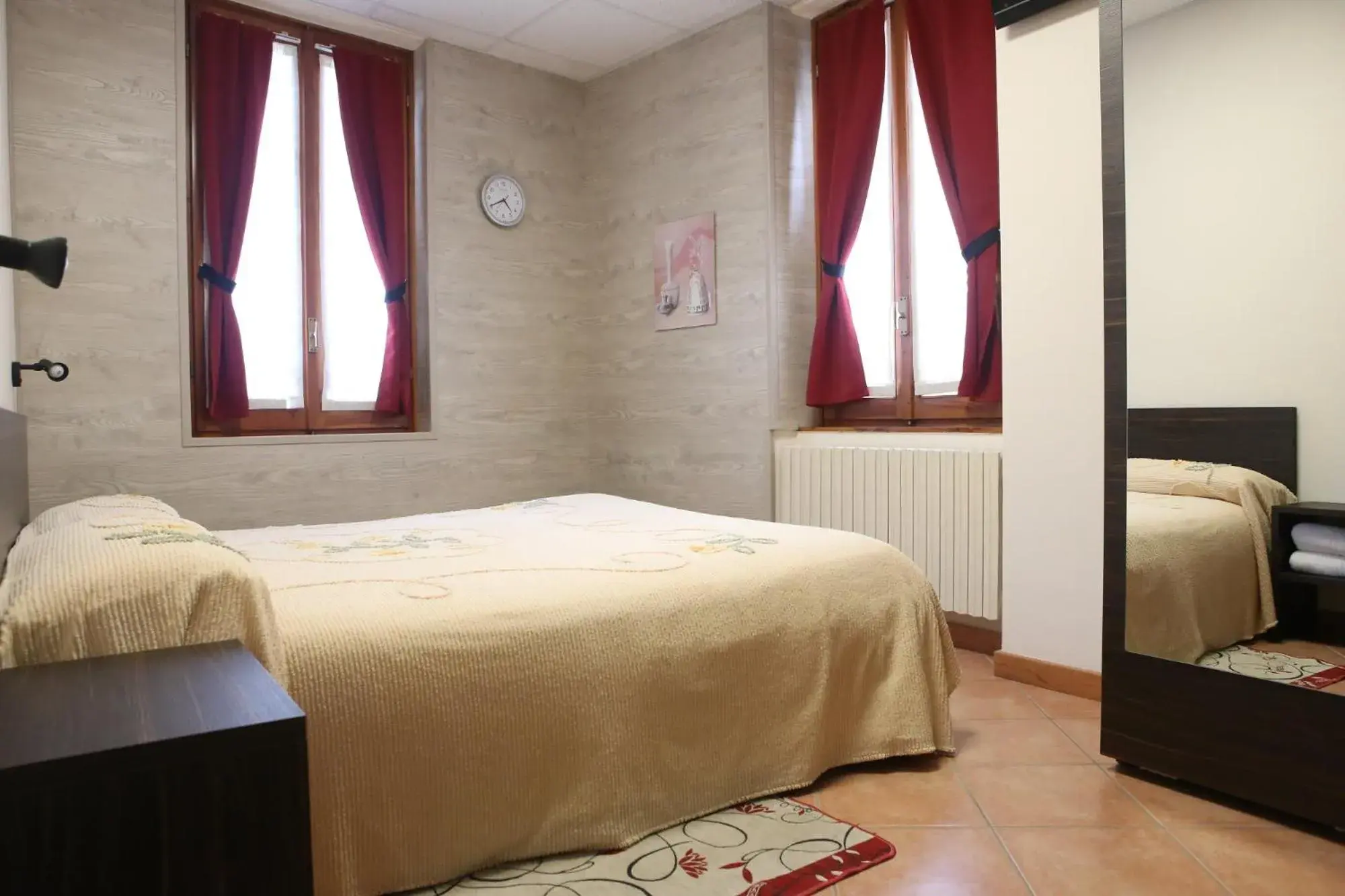 Bed in Albergo Gusmeroli