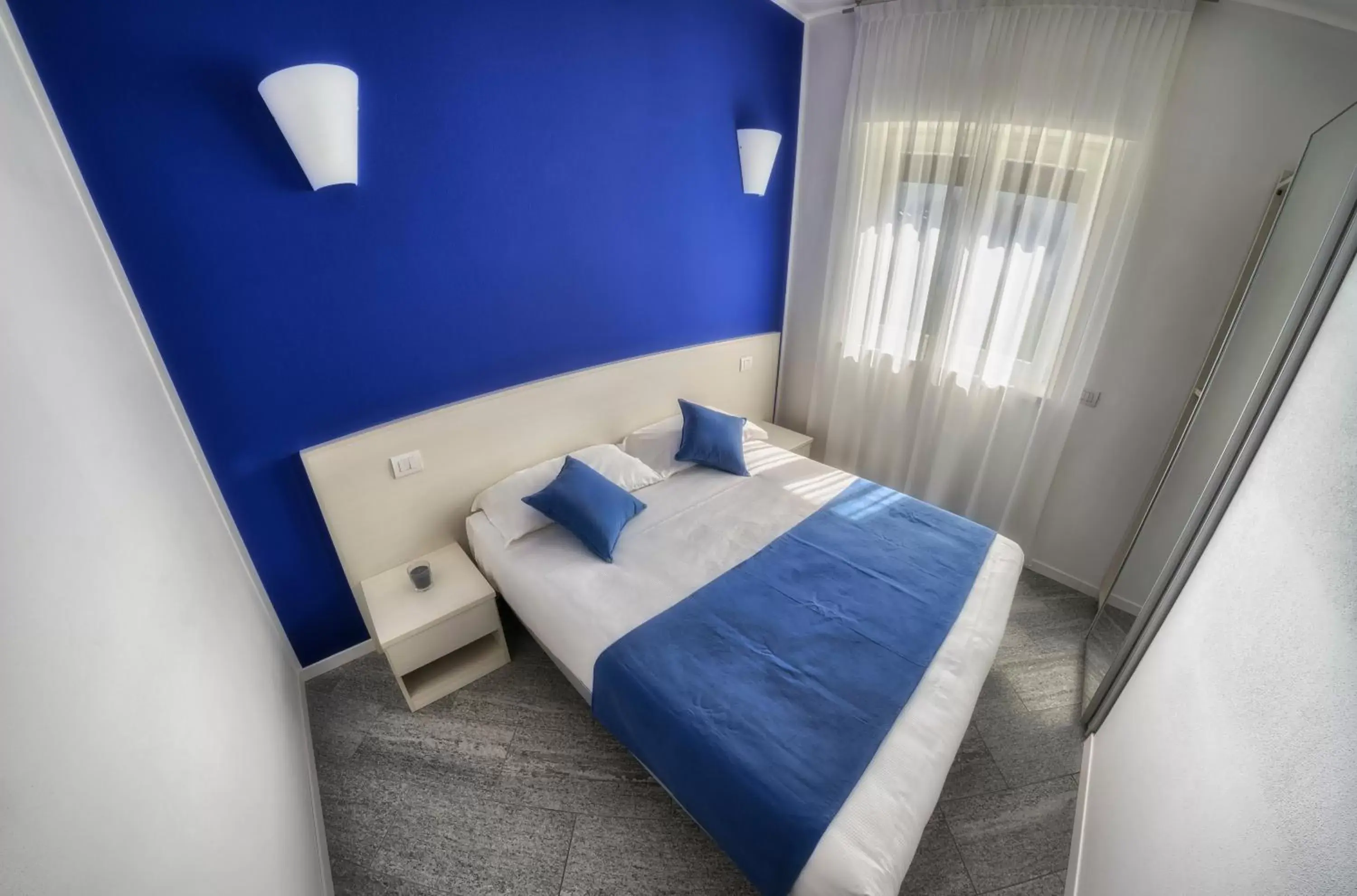 Photo of the whole room, Bed in Rainbow Holiday Apartments Lake Como
