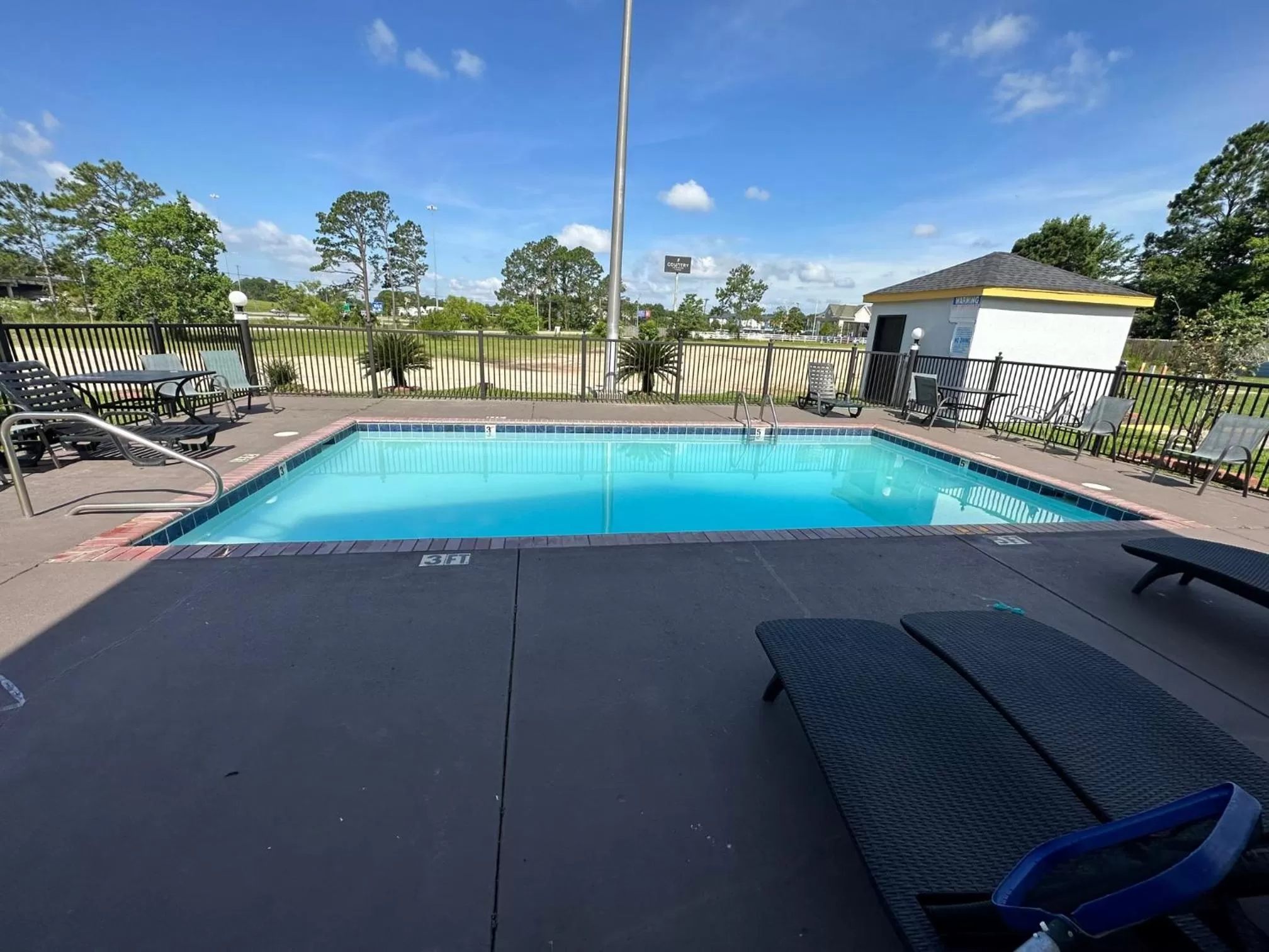 Swimming pool in Super 8 by Wyndham Ocean Springs Biloxi