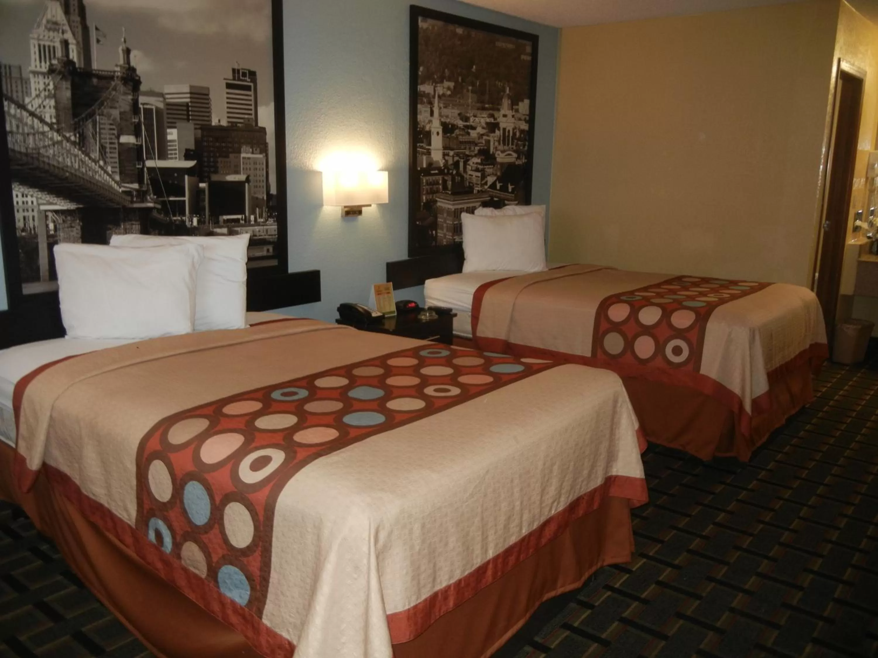 Bed in Super 8 by Wyndham Cincinnati-Springdale OH