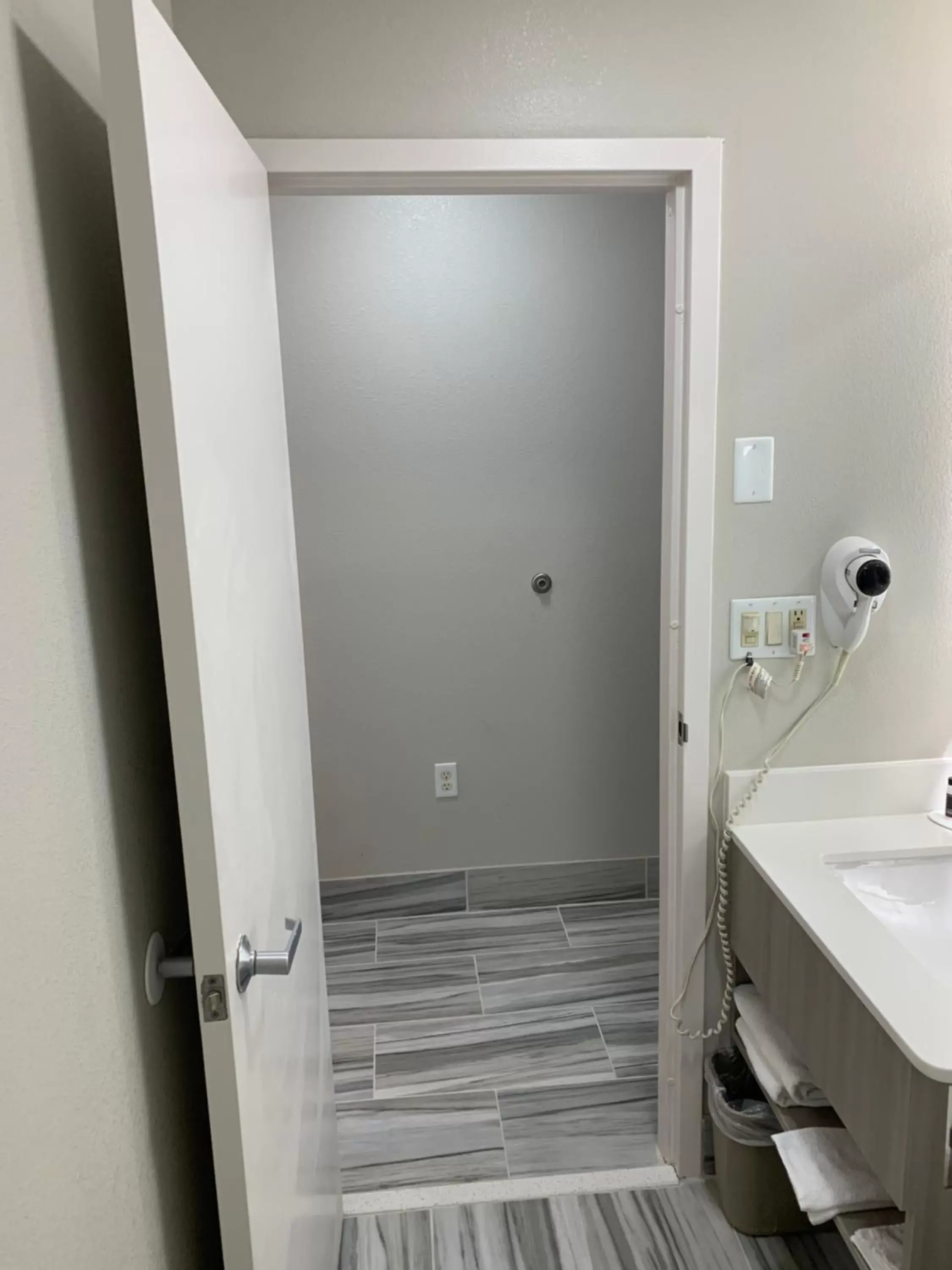 Bathroom in Microtel Inn by Wyndham Charlotte Airport