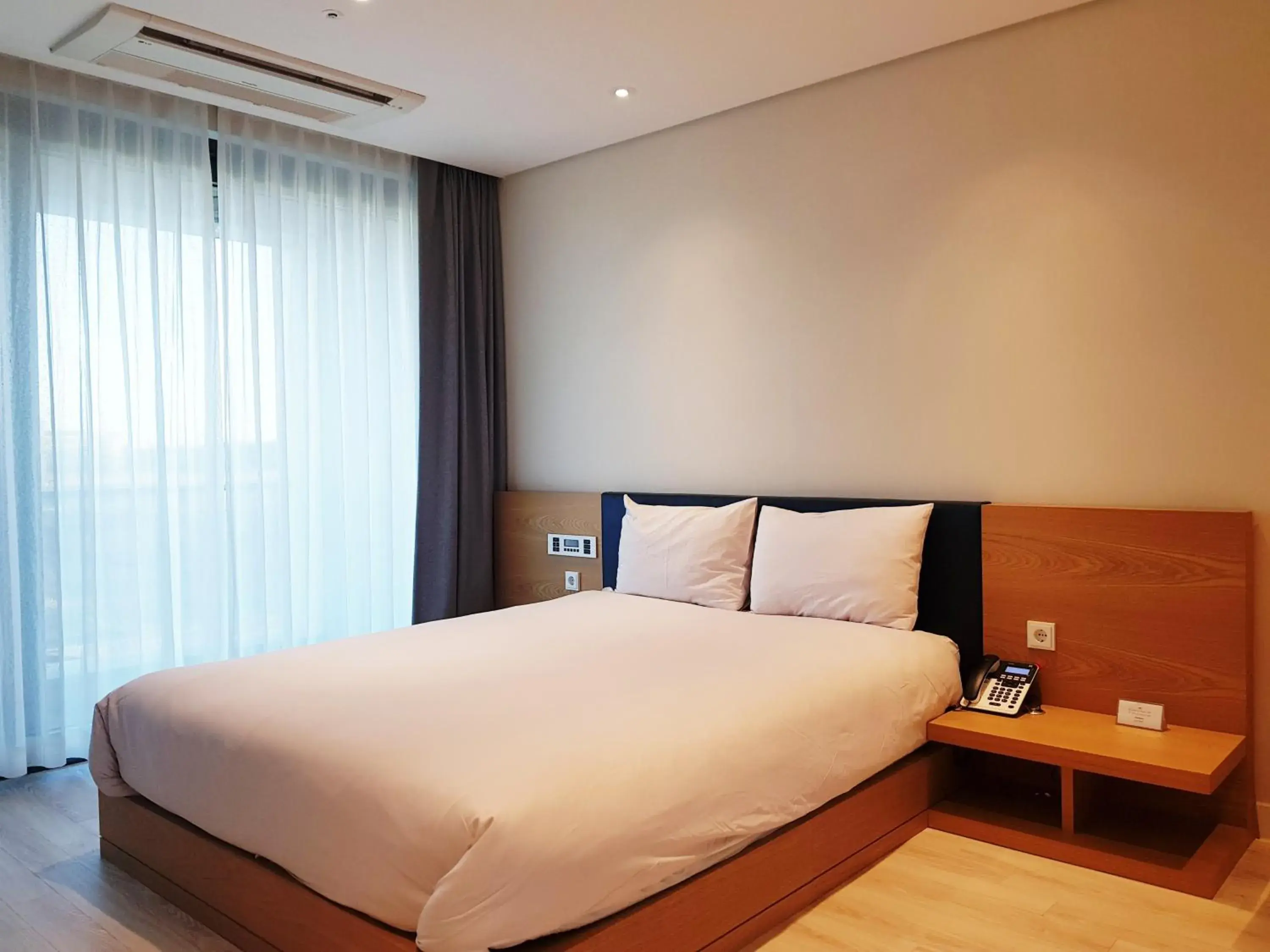 Bed in Attirance Pool Villa & Hotel Bed in Attirance Pool Villa & Hotel