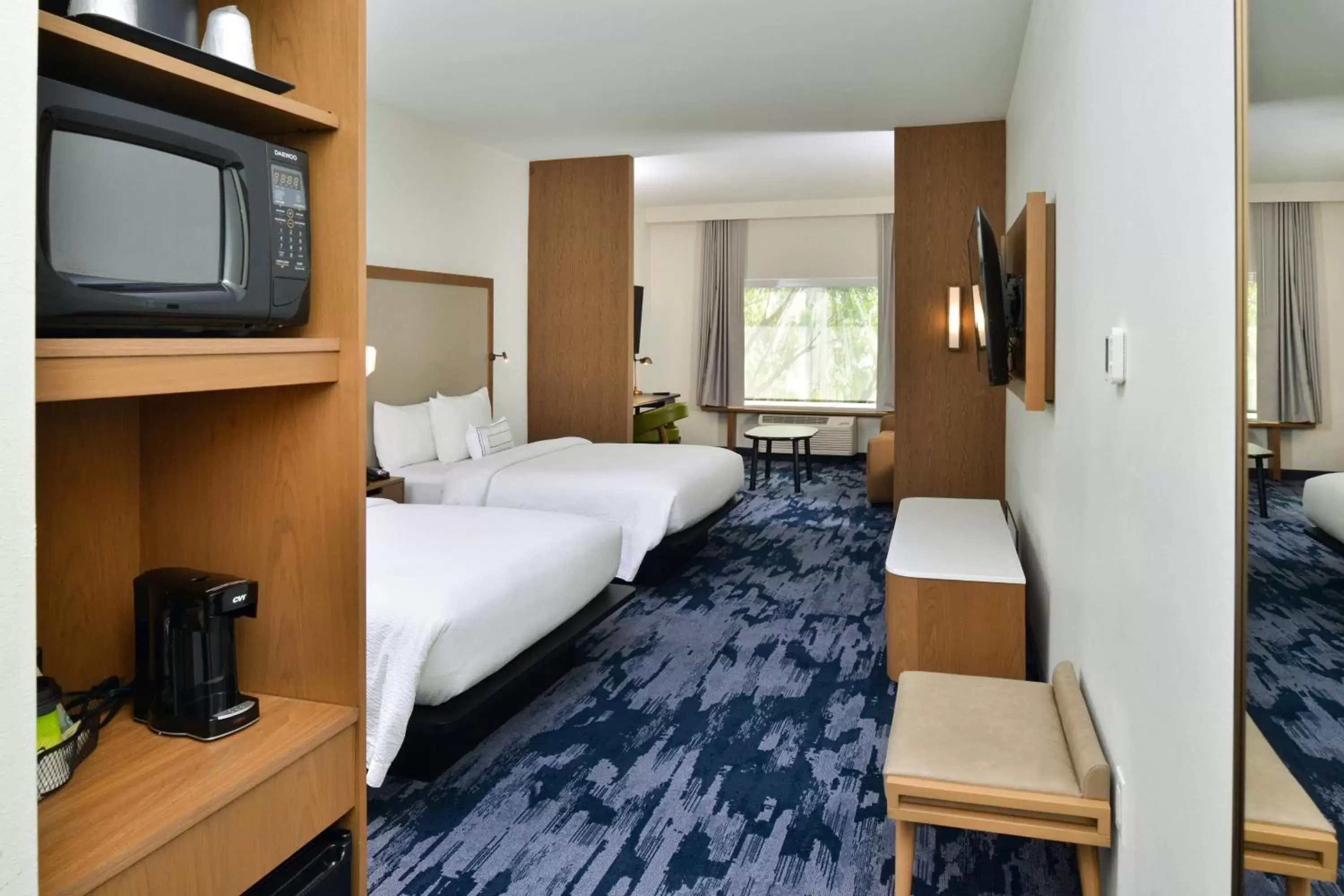 Photo of the whole room, Bed in Fairfield Inn & Suites by Marriott Charlotte University Research Park