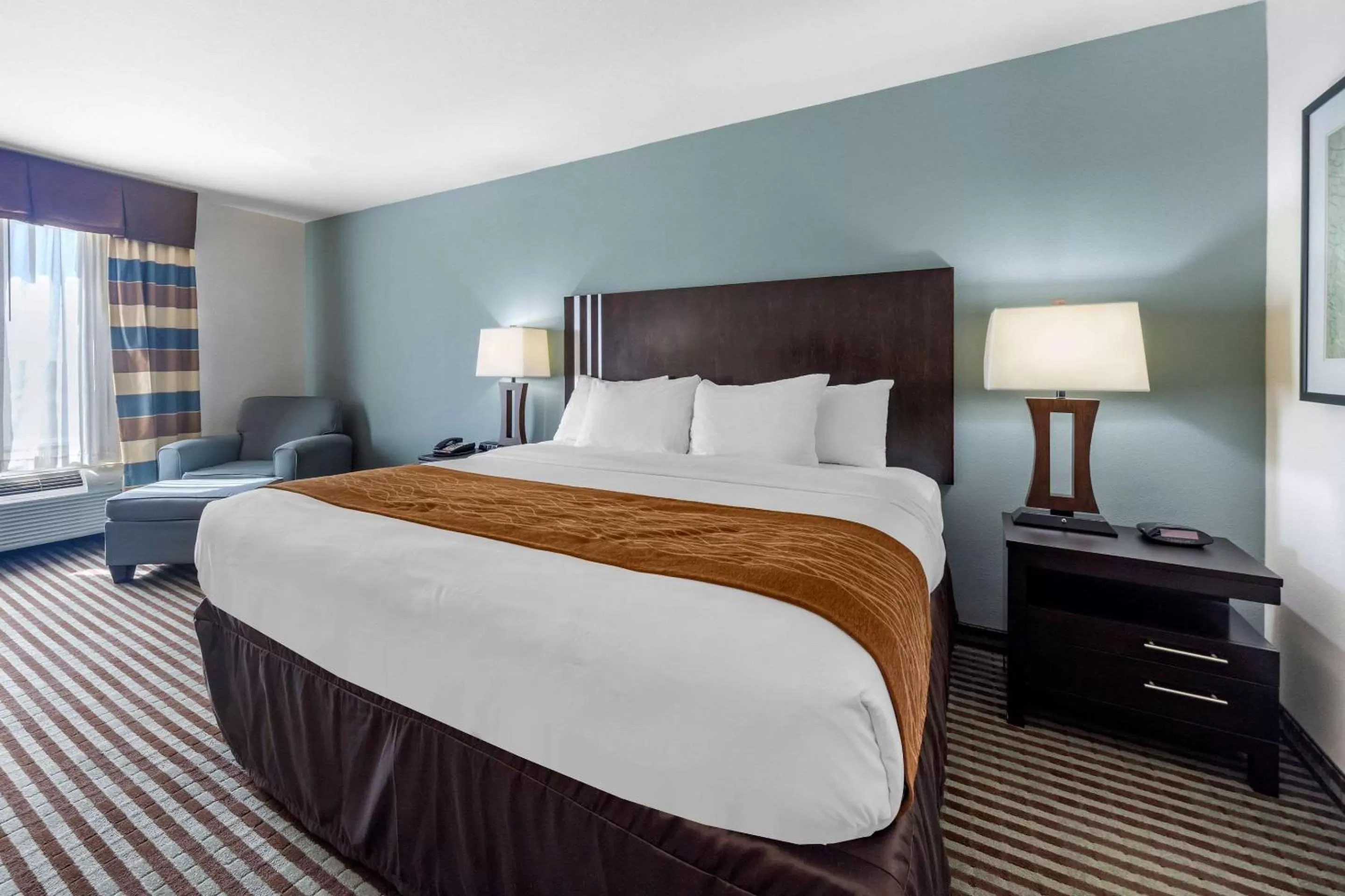 Photo of the whole room, Bed in Comfort Inn & Suites Perry I-35