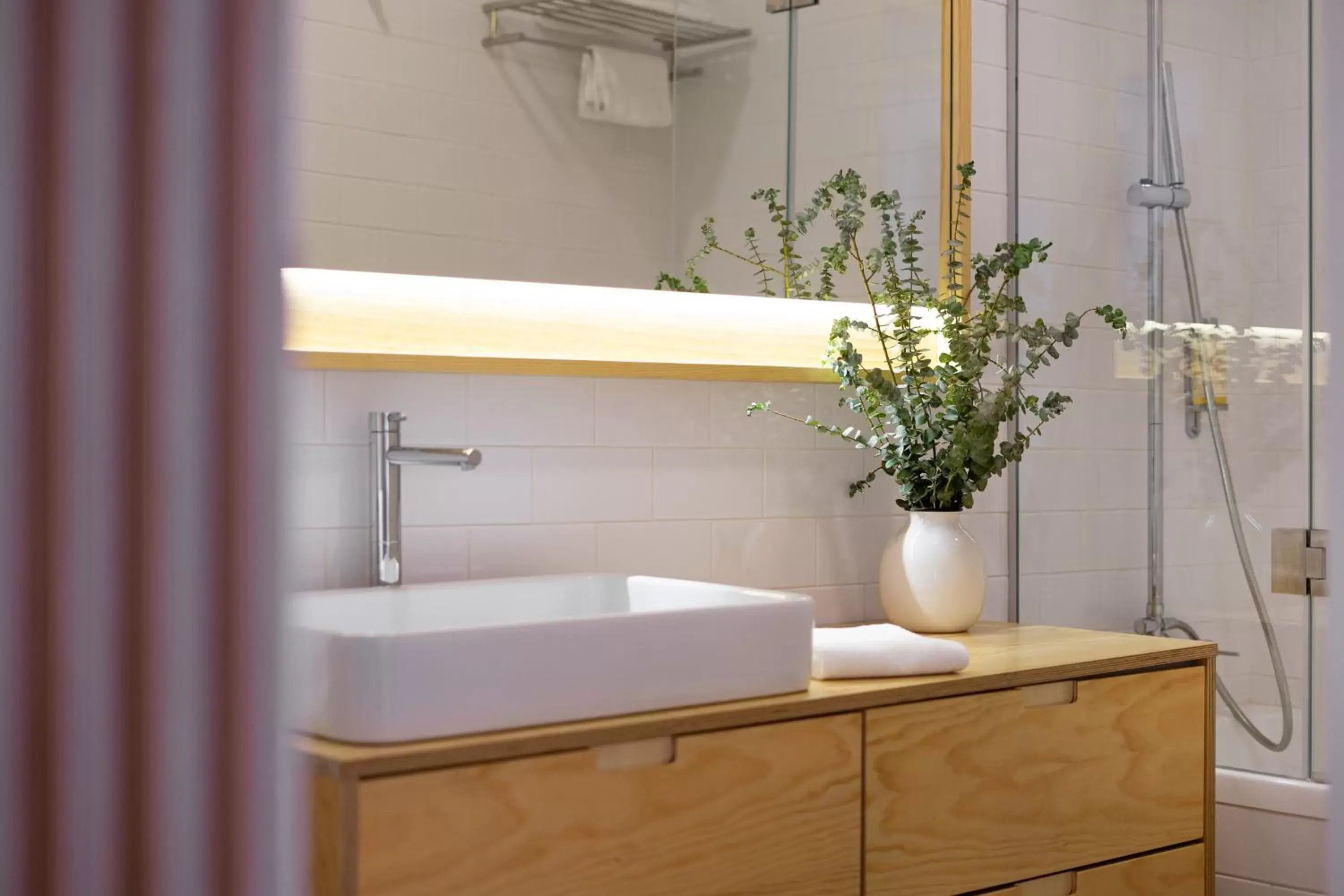 Bathroom in Entre Ruas Apartments