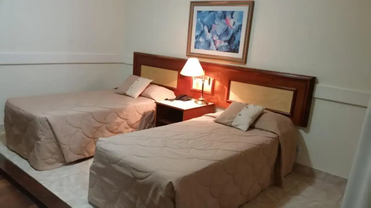 Bed in Tamareiras Park Hotel