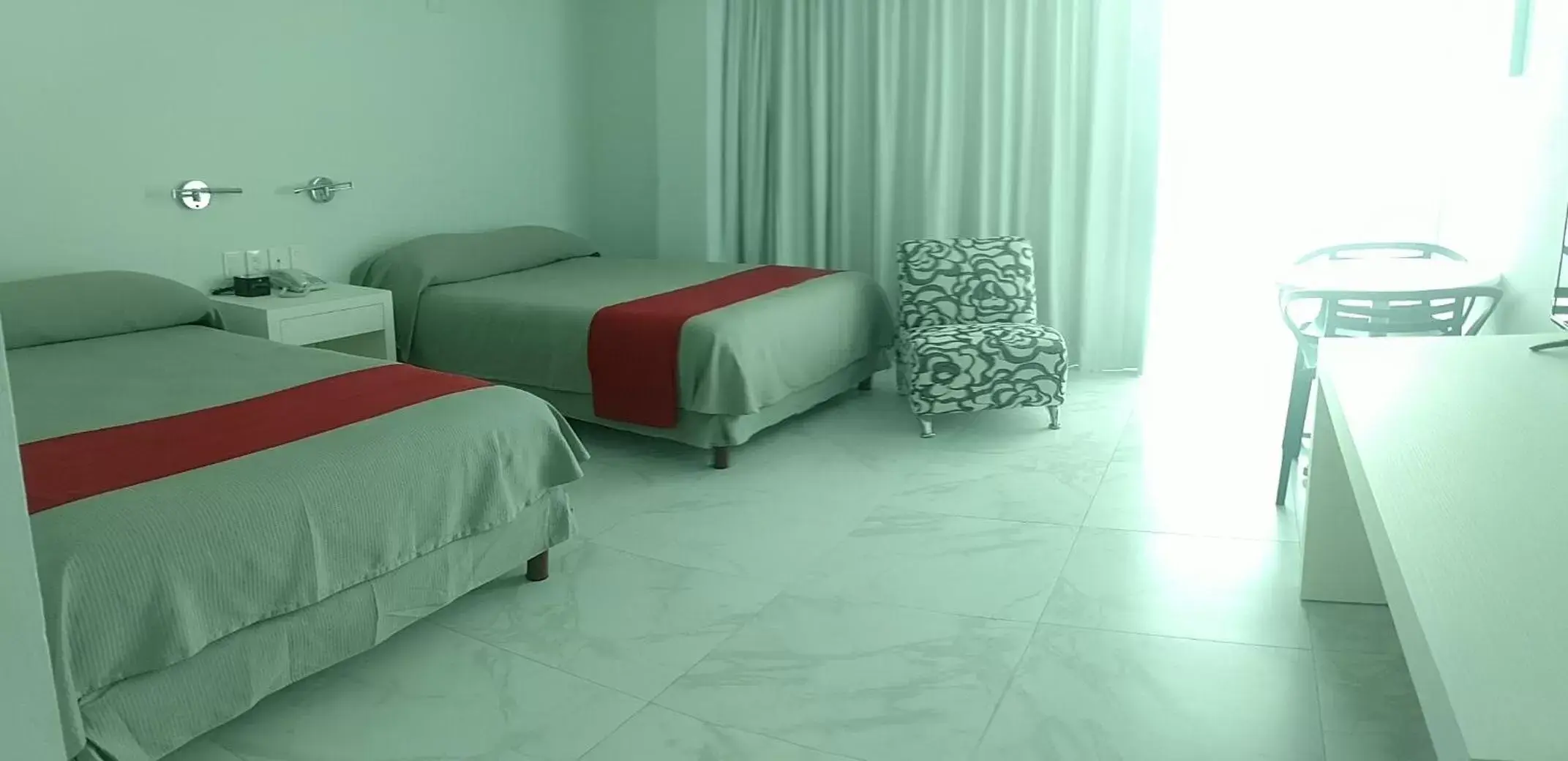 Bed in We Hotel Acapulco