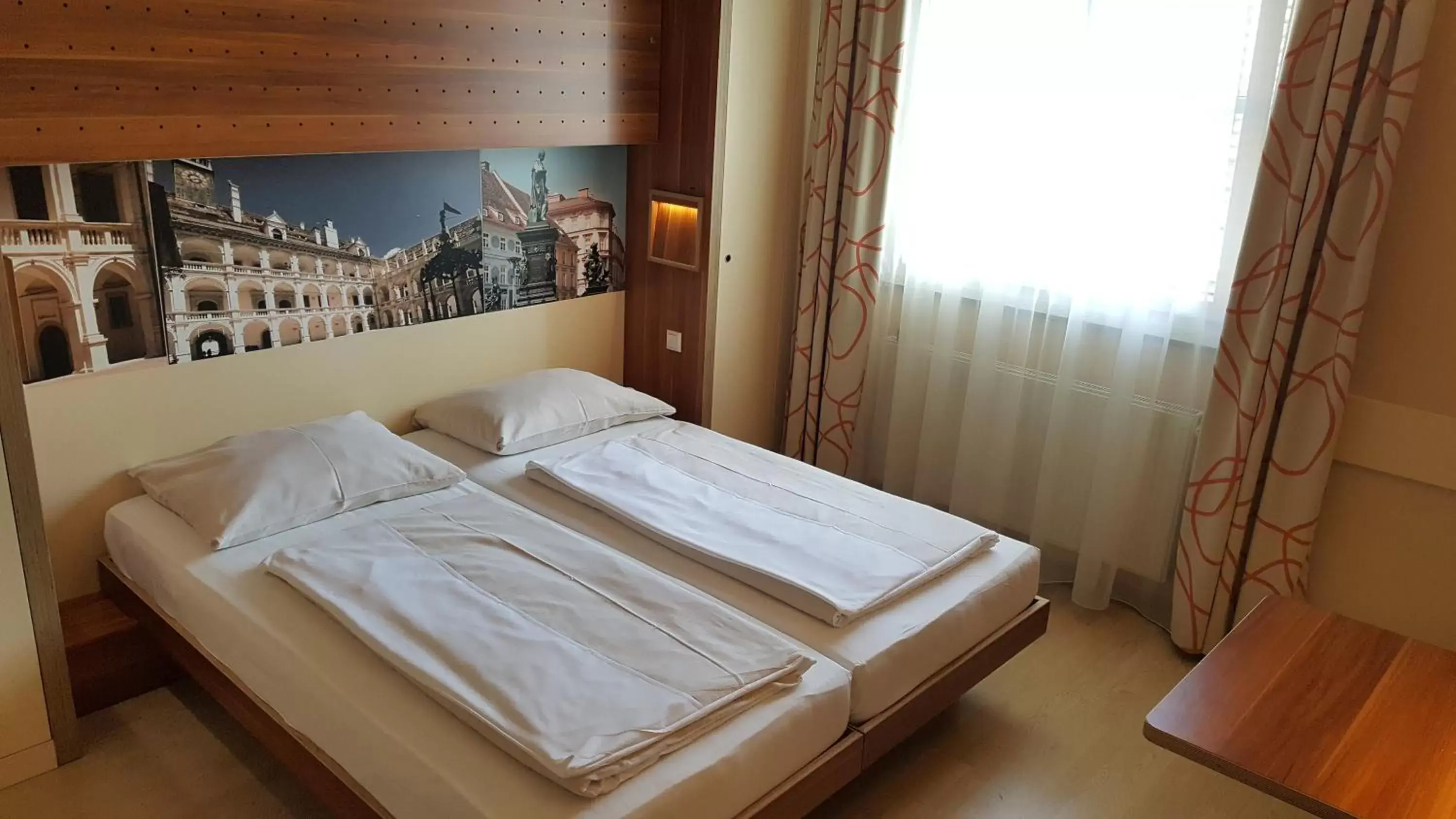 Photo of the whole room, Bed in JUFA Hotel Graz