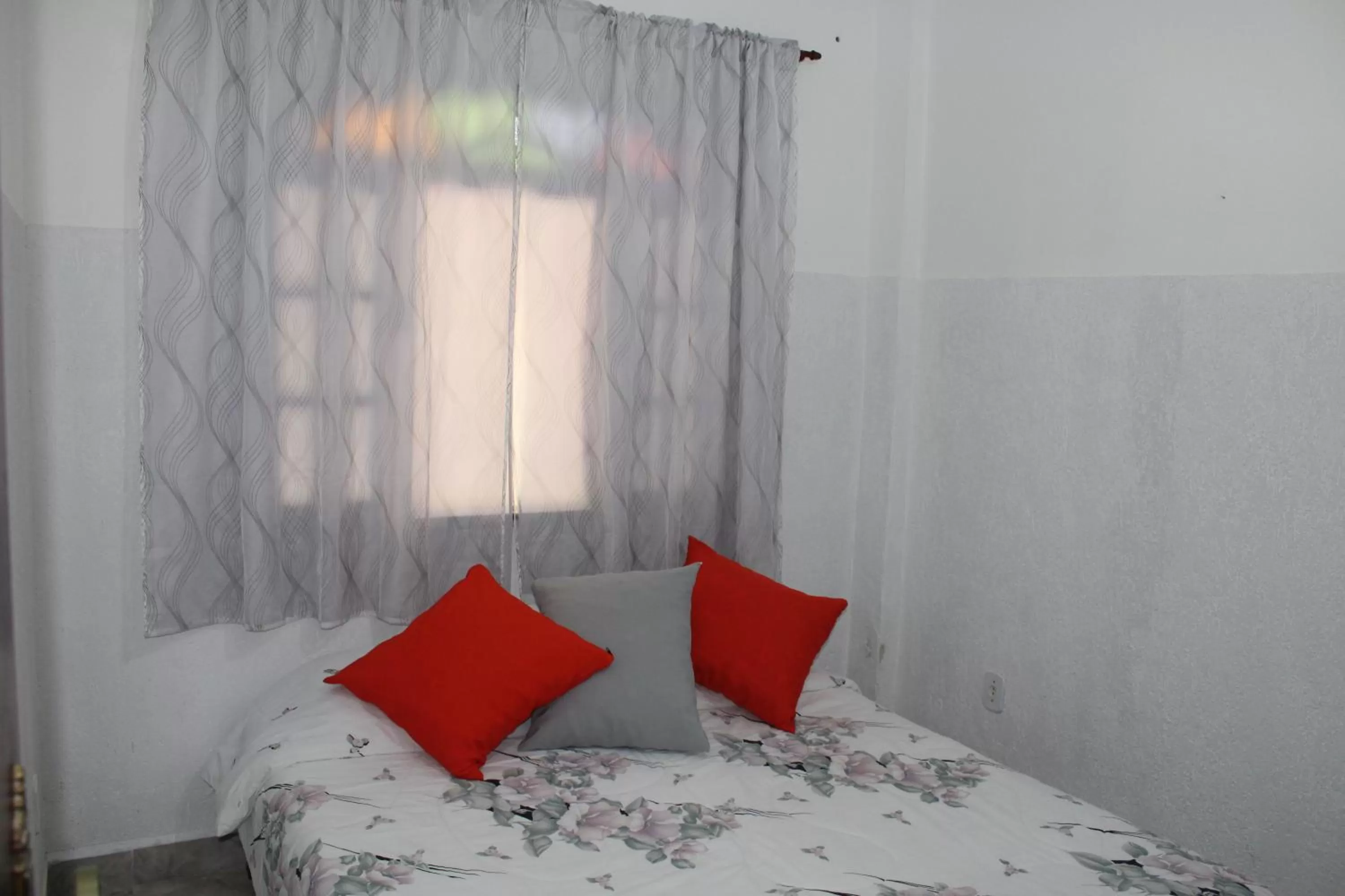 Bed in Pousada Recanto Das Emerências