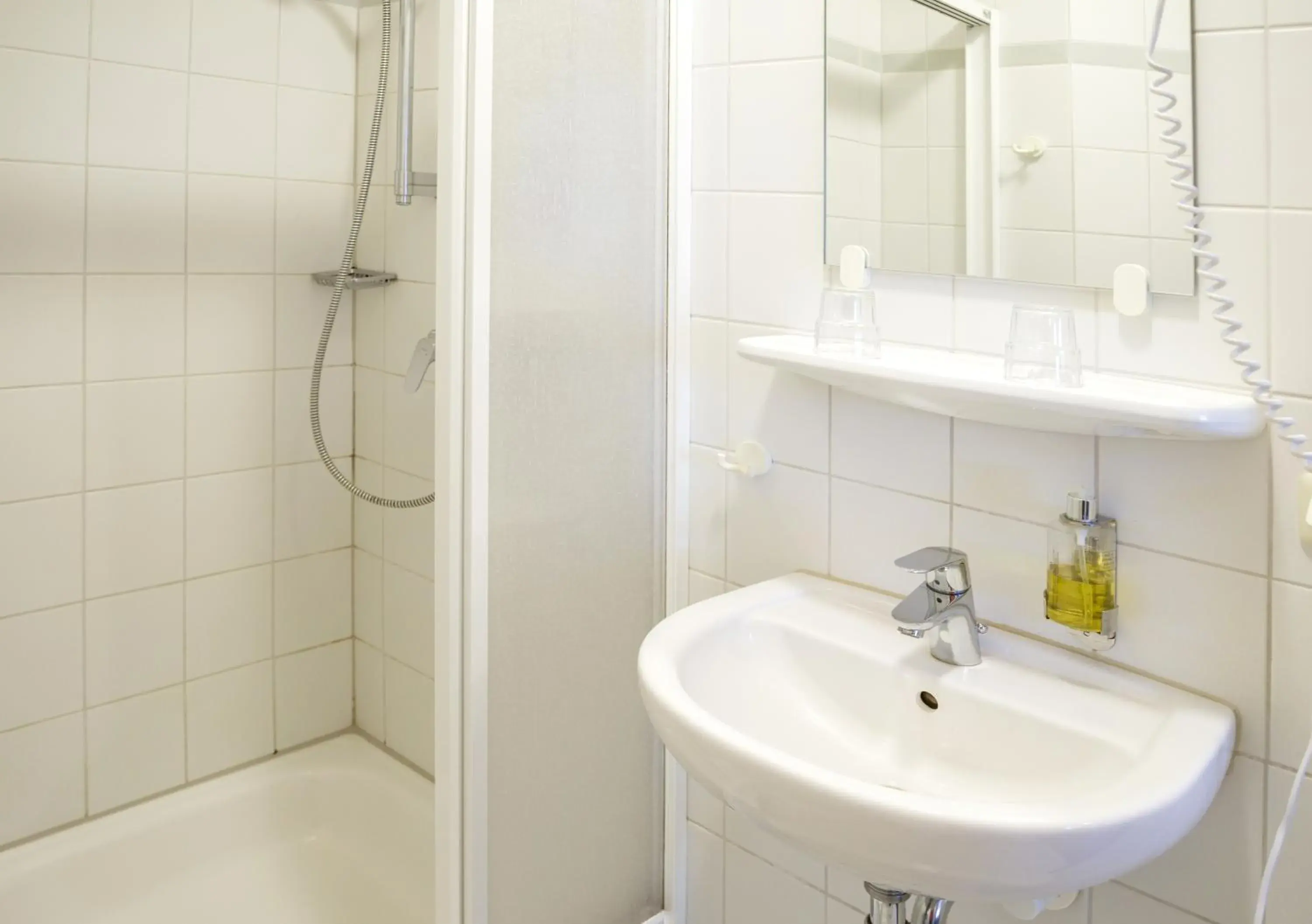 Shower, Bathroom in Hotel Koenigstein Kiel by Tulip Inn