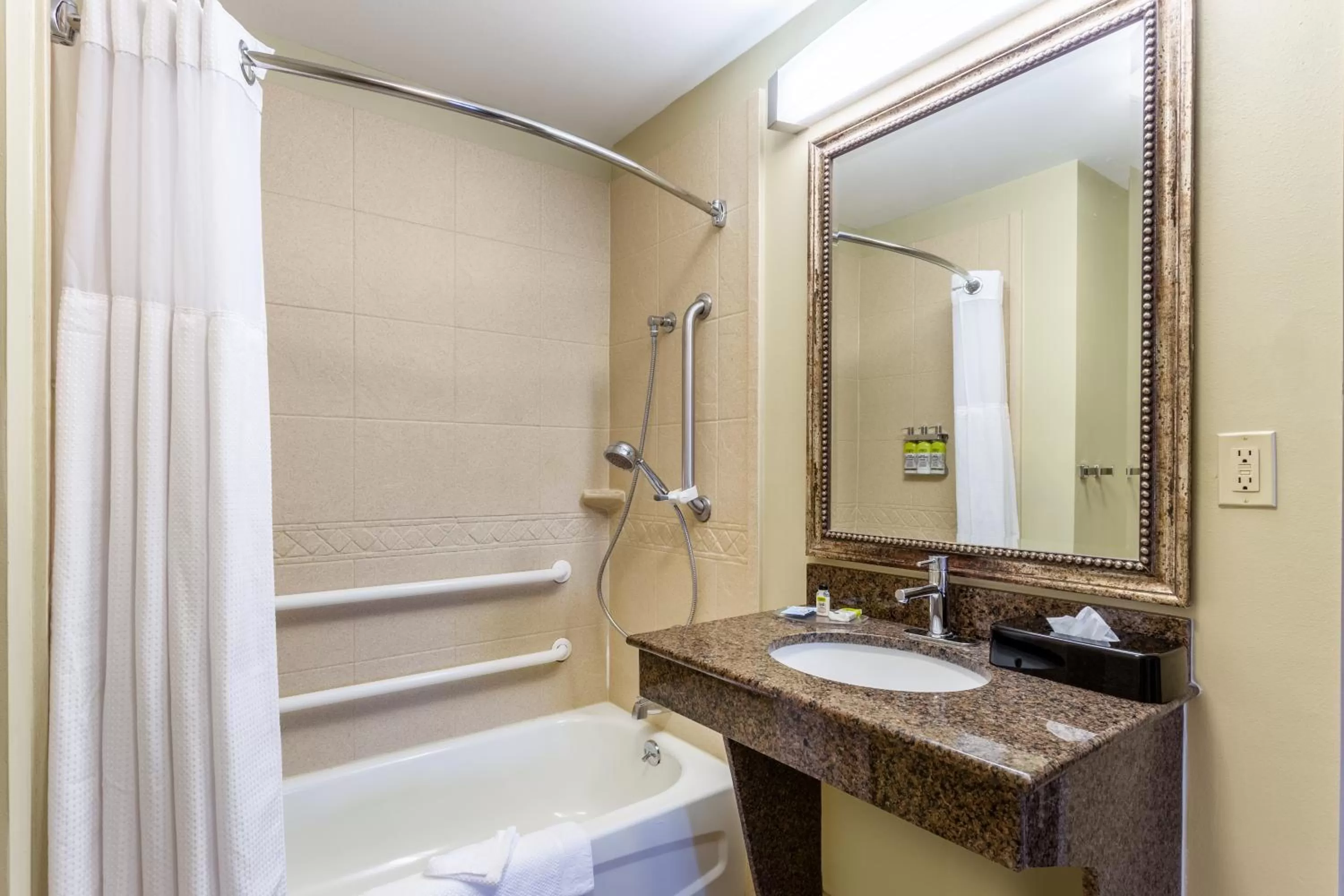 Bathroom in Candlewood Suites Harrisburg I-81 Hershey Area by IHG