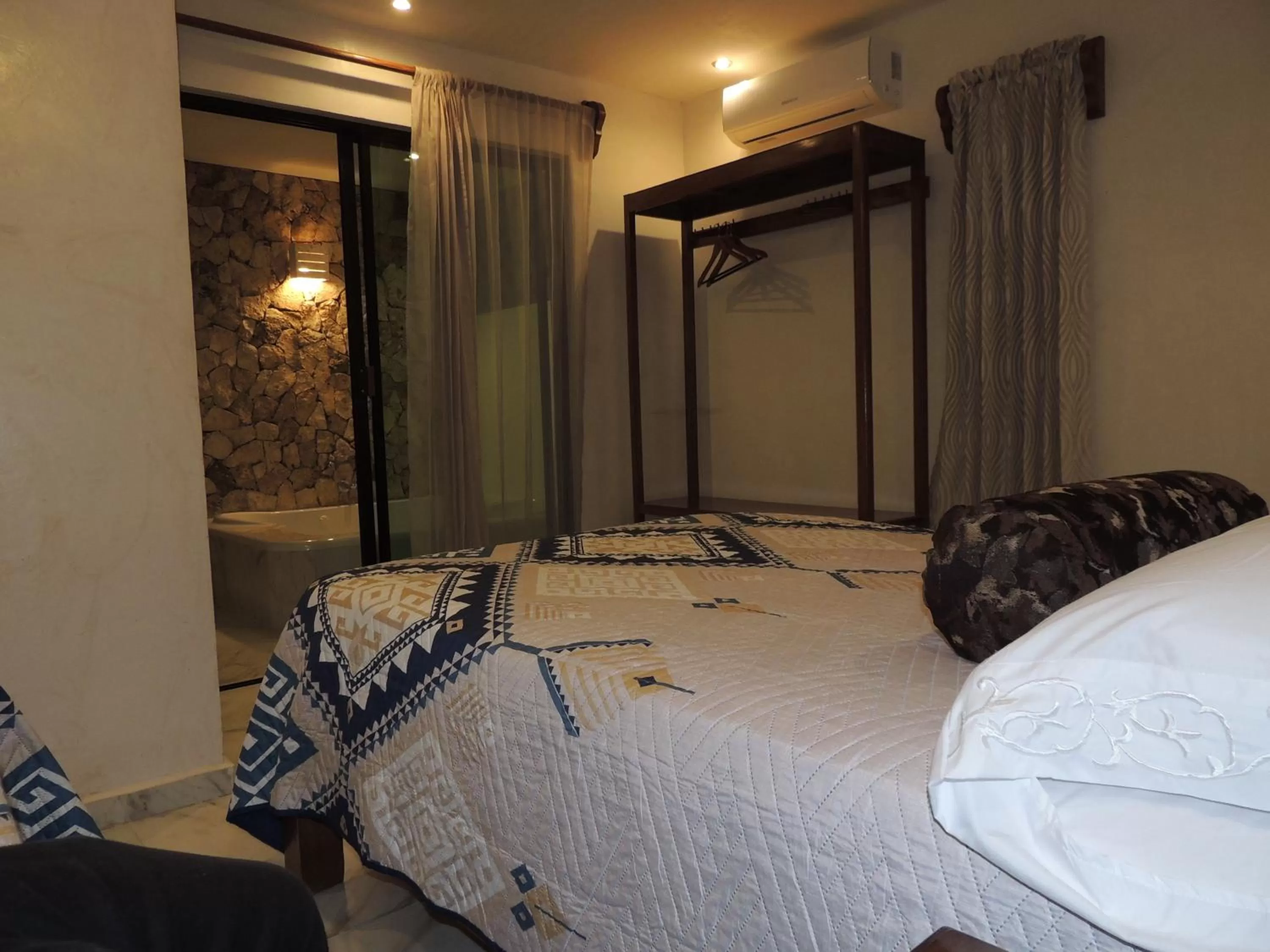 Bed in Hotel Boutique Bugambilias