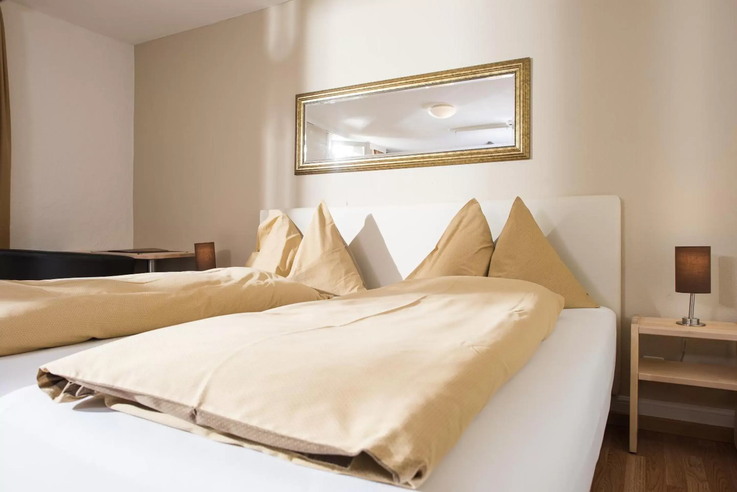 Bed in Jungfrau Hotel