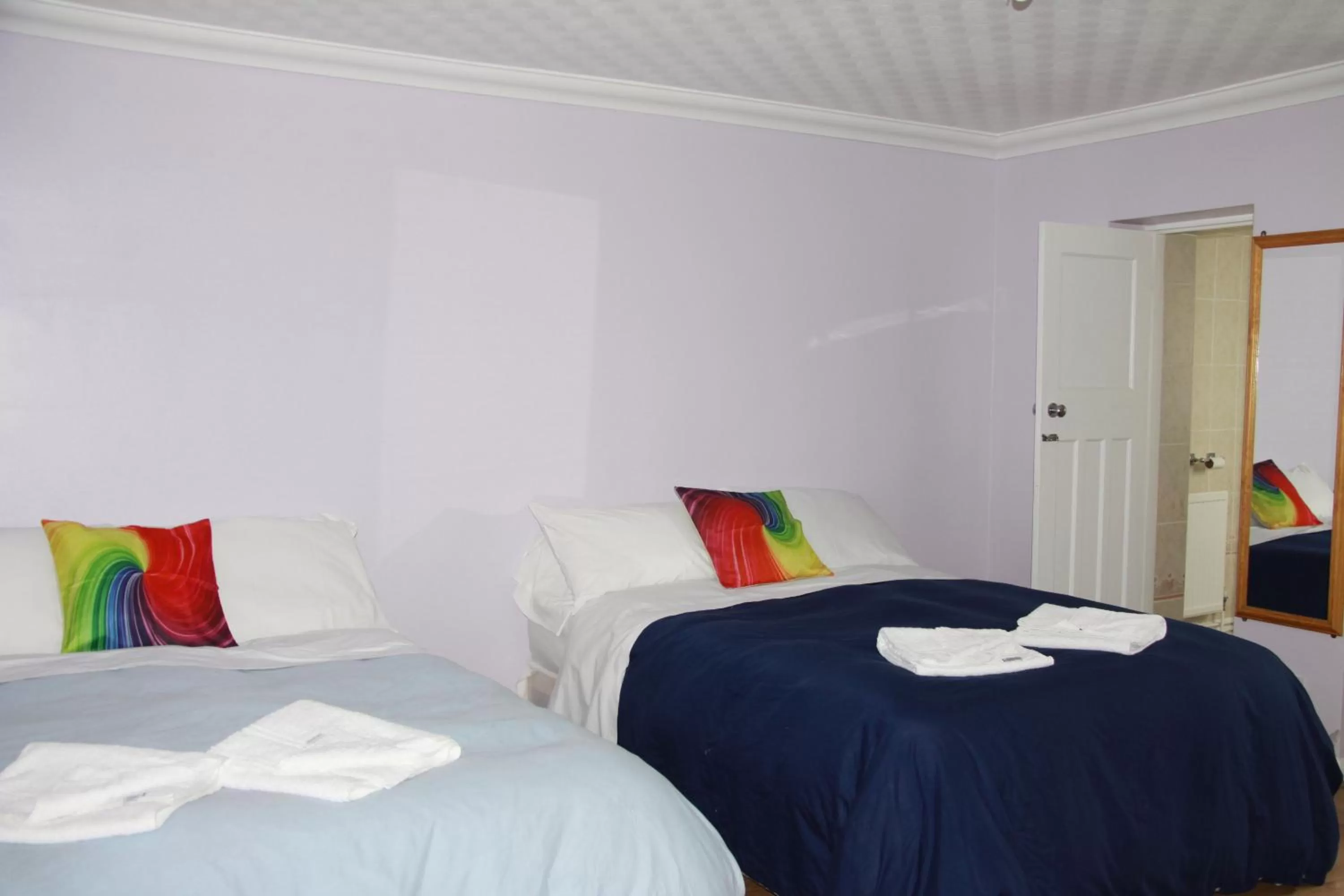 Bed in Ambassador Hotel