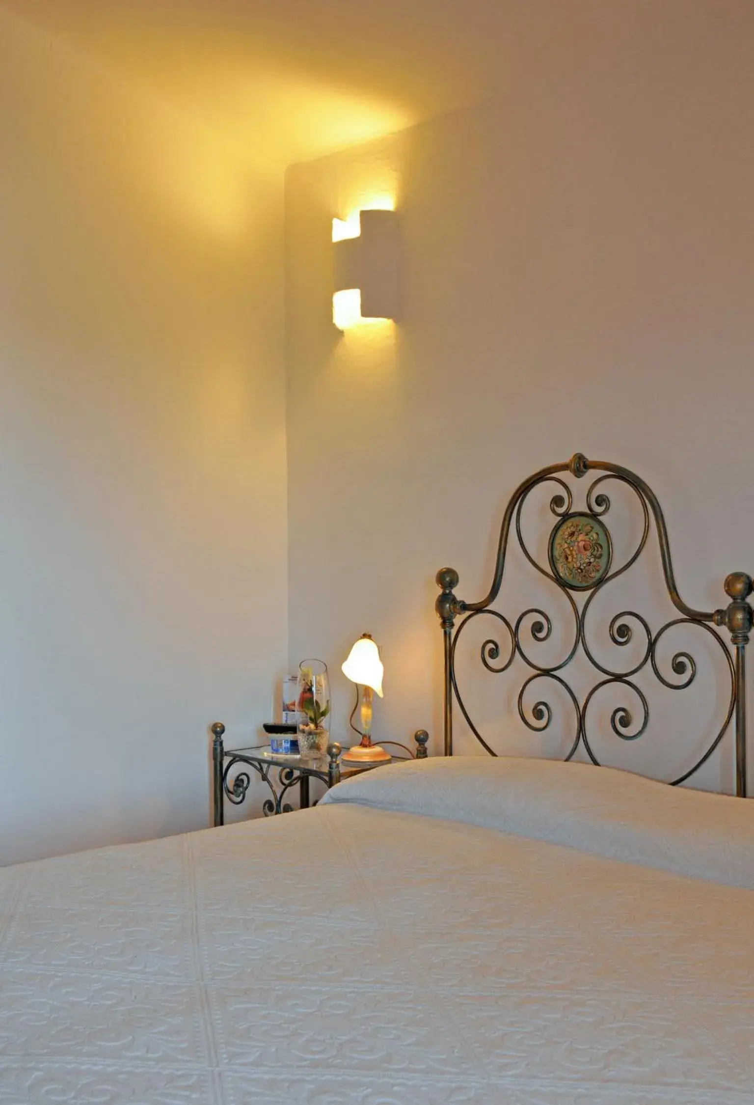 Decorative detail, Bed in Hotel Il Piccolo Golf