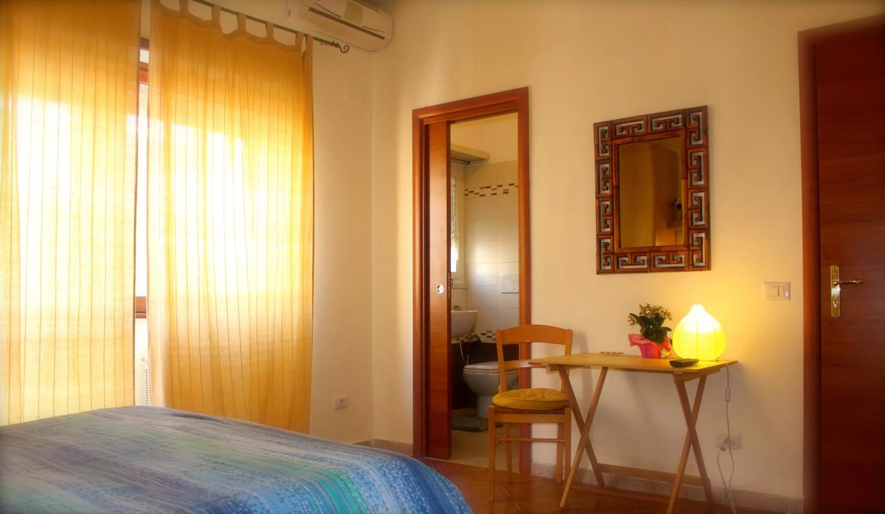 Room Photo in Al Porto Di Roma B&B